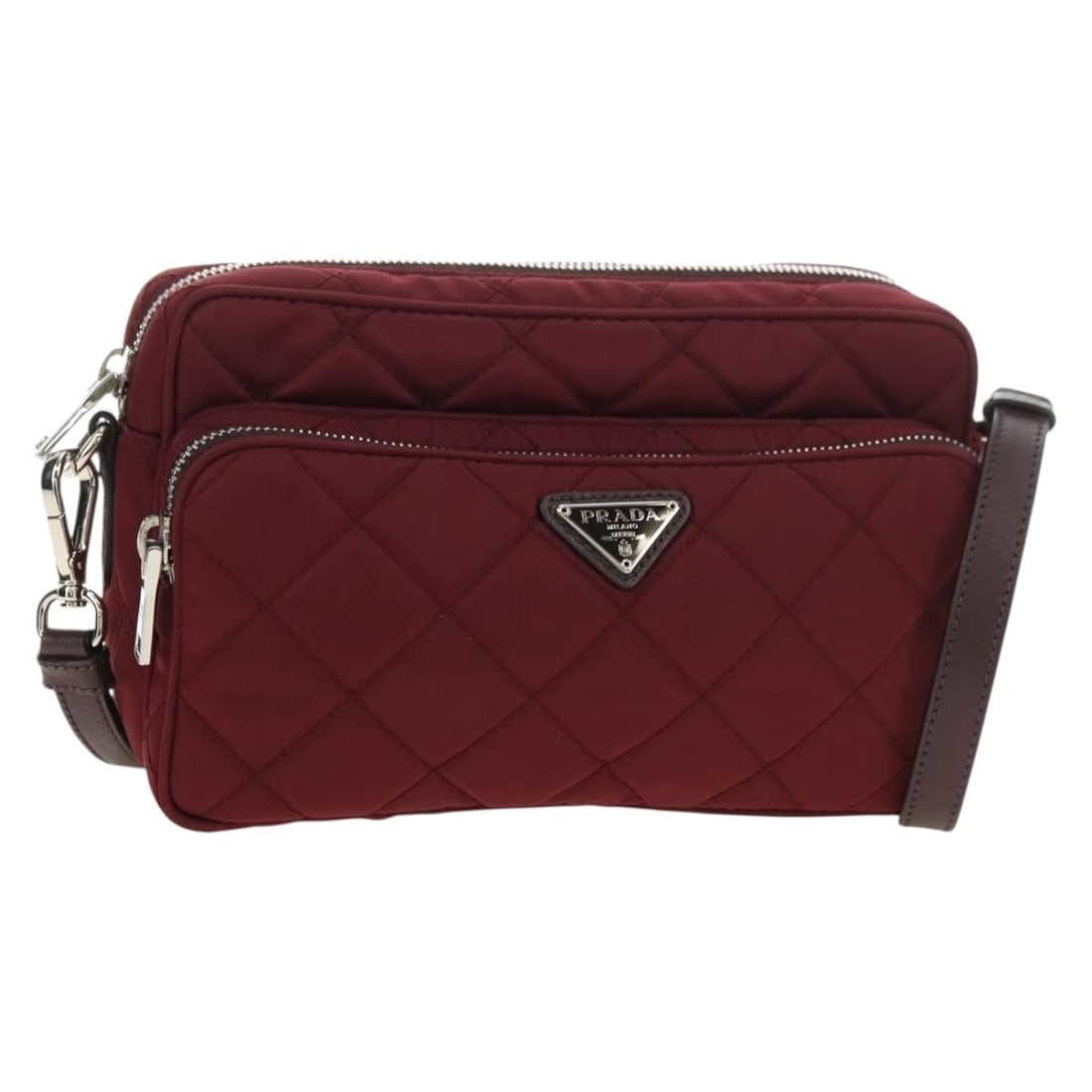 PRADA Nylon Shoulder Bag Bordeaux Silver Tone with Dust Bag: PRADA Nylon Shoulder Bag Bordeaux Silver Tone with Dust Bag A Prada shoulder bag in bordeaux and silver, crafted from nylon. It comes with a dust bag and is described as being in excellent condition o
