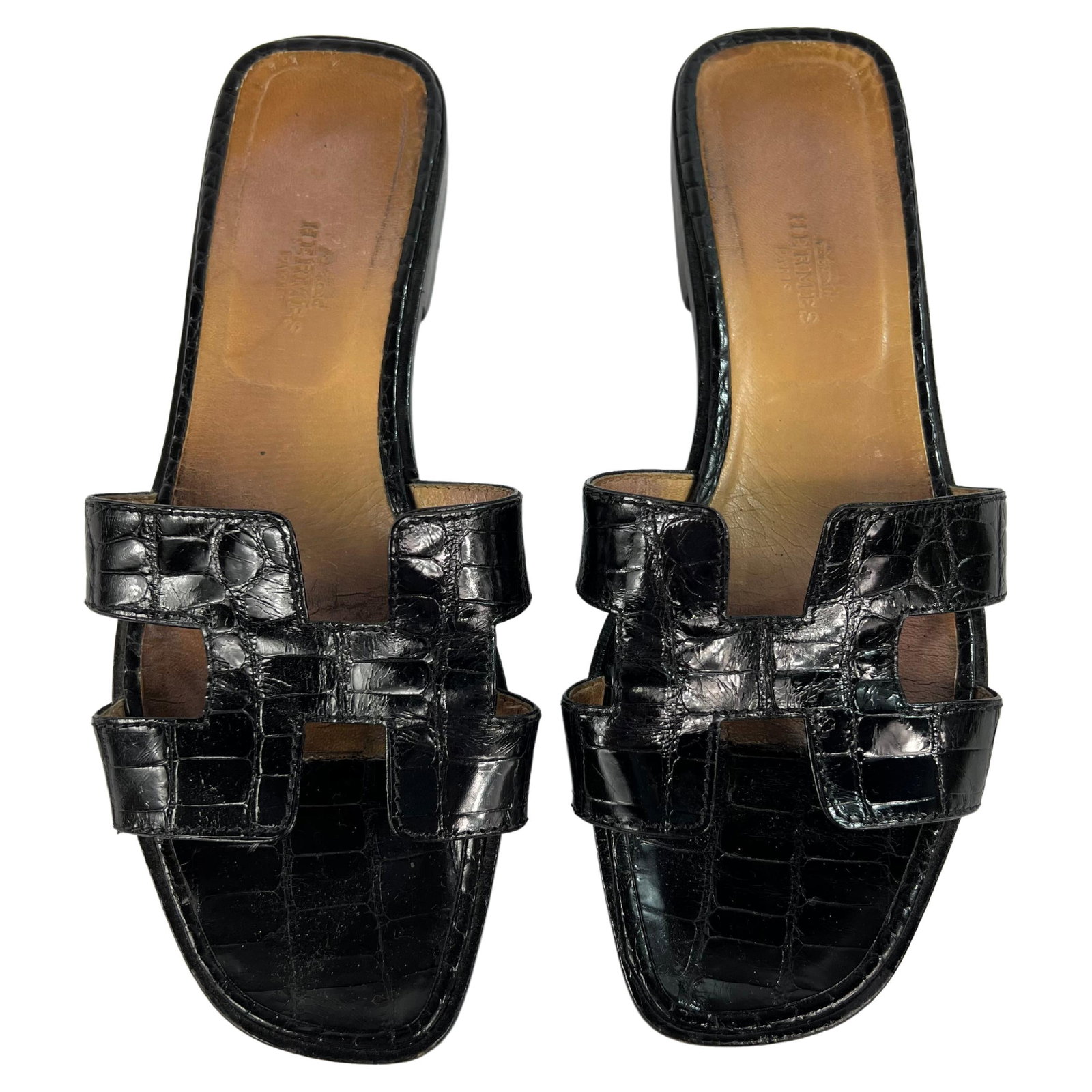 Hermes Oran flat slide sandals black alligator leather size 38.5: Hermes Oran flat slide sandals black alligator leather size 38.5 Hermes Paris Oran flat slide sandals in black alligator leather with a shiny finish. The design features the signature H cut-out style 