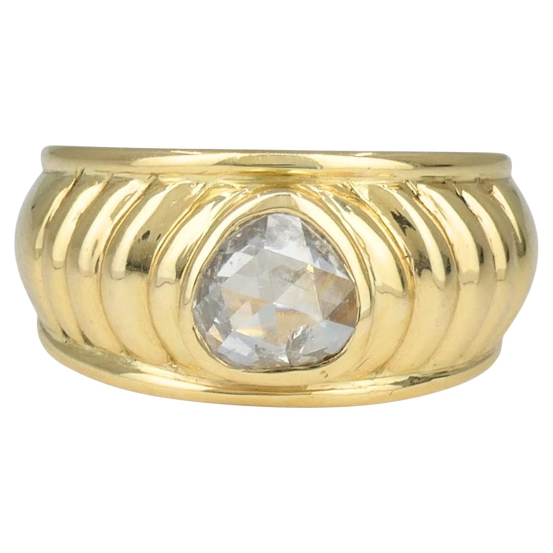 French 18k Gold Wide Band Ring with Rose Cut Diamond: French 18k Gold Wide Band Ring with Rose Cut Diamond Vintage French band ring in 18k yellow gold featuring a raised bezel-set rose cut diamond. This circa 1980s piece is designed with a polished domed