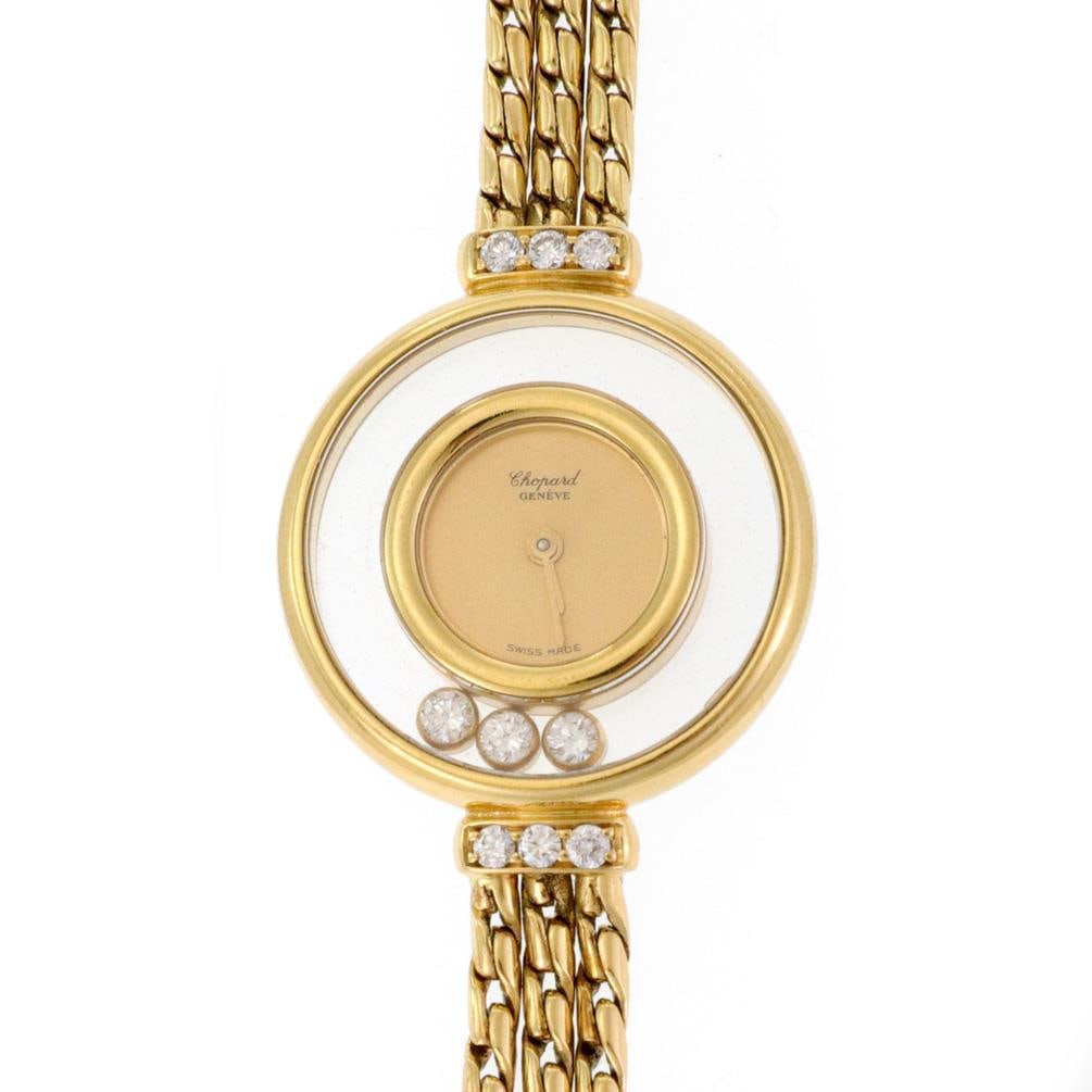 Chopard Happy Diamond 18k Yellow Gold Ladies Watch with Diamonds: Chopard Happy Diamond 18k Yellow Gold Ladies Watch with Diamonds This exquisite Chopard Happy Diamond ladies wristwatch features an elegant design crafted from 18k yellow gold. The watch showcases a d