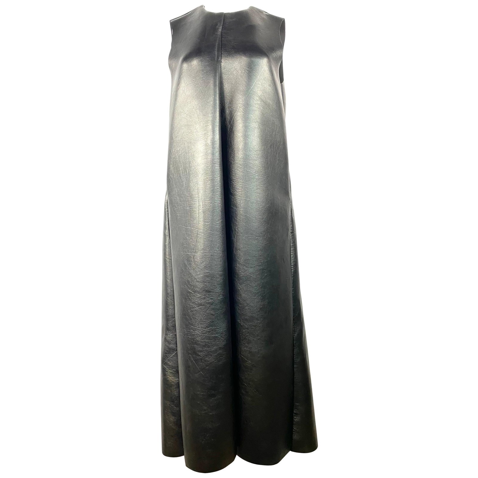 Melitta Baumeister faux leather maxi dress in black size M: Melitta Baumeister faux leather maxi dress in black size M A black faux leather sleeveless maxi dress by Melitta Baumeister, featuring a crew neck, side pockets, and a rear zip closure. Marked size M,