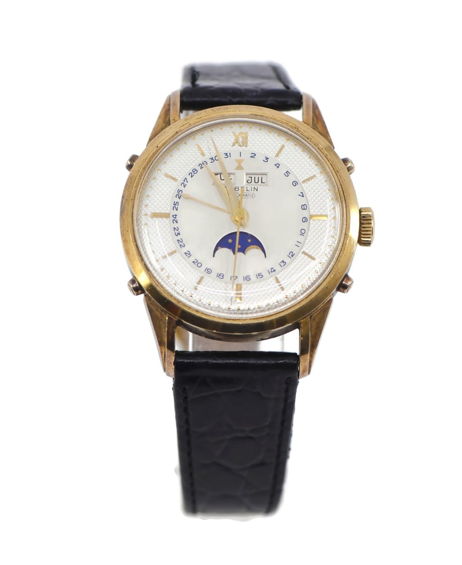 Gubelin Triple Calendar 18K Gold Automatic Watch with Leather Band: Gubelin Triple Calendar 18K Gold Automatic Watch with Leather Band This exquisite Gubelin Triple Calendar wristwatch features a stunning 18K yellow gold case and a sophisticated silver dial, embodying