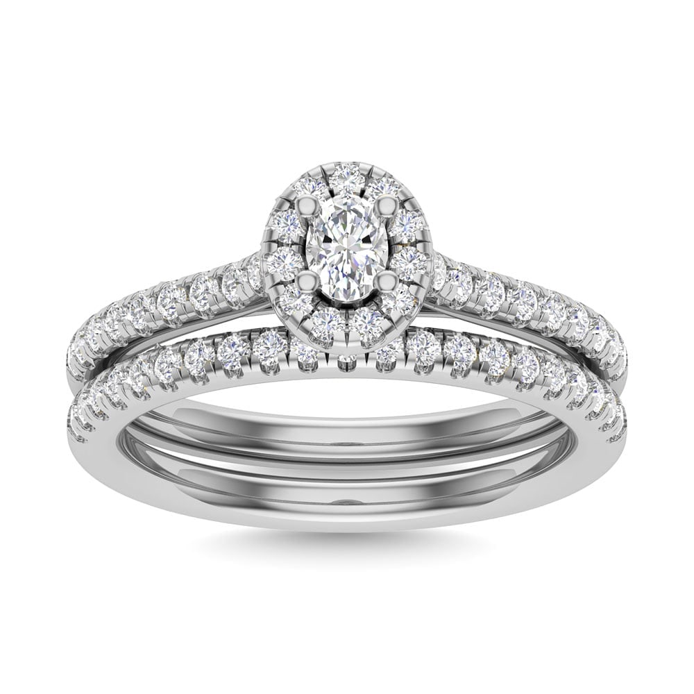 Diamond 3/4 Ct.Tw. Oval Cut Bridal Ring in 14K White Gold: Diamond 3/4 Ct.Tw. Oval Cut Bridal Ring in 14K White Gold Diamond 3/4 Ct.Tw. Oval Cut Bridal Ring in 14K White Gold 14k White Gold Stone Color: G-h Stone Clarity: I2 Each ring is presented in standard