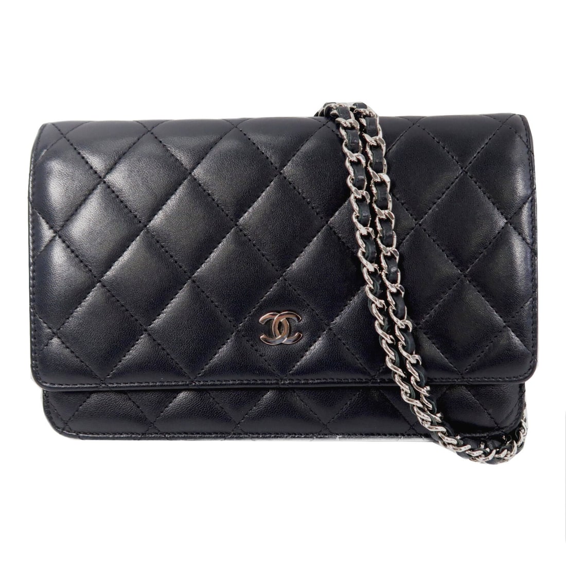 CHANEL AP0250 WOC shoulder bag black lambskin with silver tone CC: CHANEL AP0250 WOC shoulder bag black lambskin with silver tone CC CHANEL Wallet on Chain shoulder bag in black lambskin leather with CC detailing and a chain strap. This women's shoulder bag features 