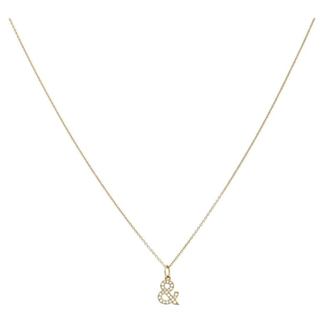 Tiffany & Co. Ampersand Diamond Pendant Necklace in 18k Gold with Box: Tiffany & Co. Ampersand Diamond Pendant Necklace in 18k Gold with Box A Tiffany & Co. charm pendant necklace featuring an ampersand charm set with pave diamonds on 18k yellow gold. The pendant is susp