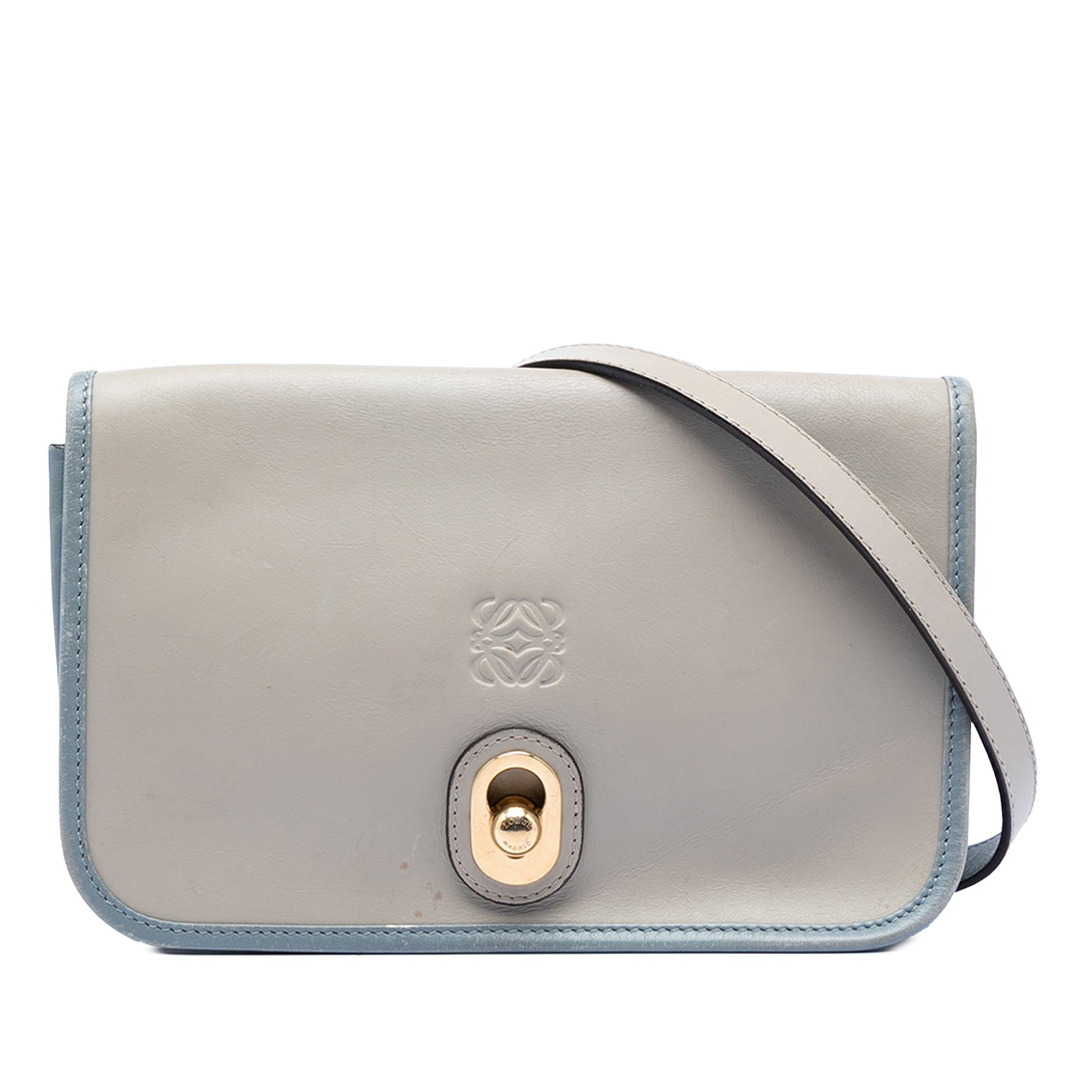 LOEWE Ines leather crossbody bag with flap lock: LOEWE Ines leather crossbody bag with flap lock This LOEWE Bicolor Leather Anagram Ines Flap Crossbody features a leather construction with an adjustable flat leather strap, a front flap secured by a 