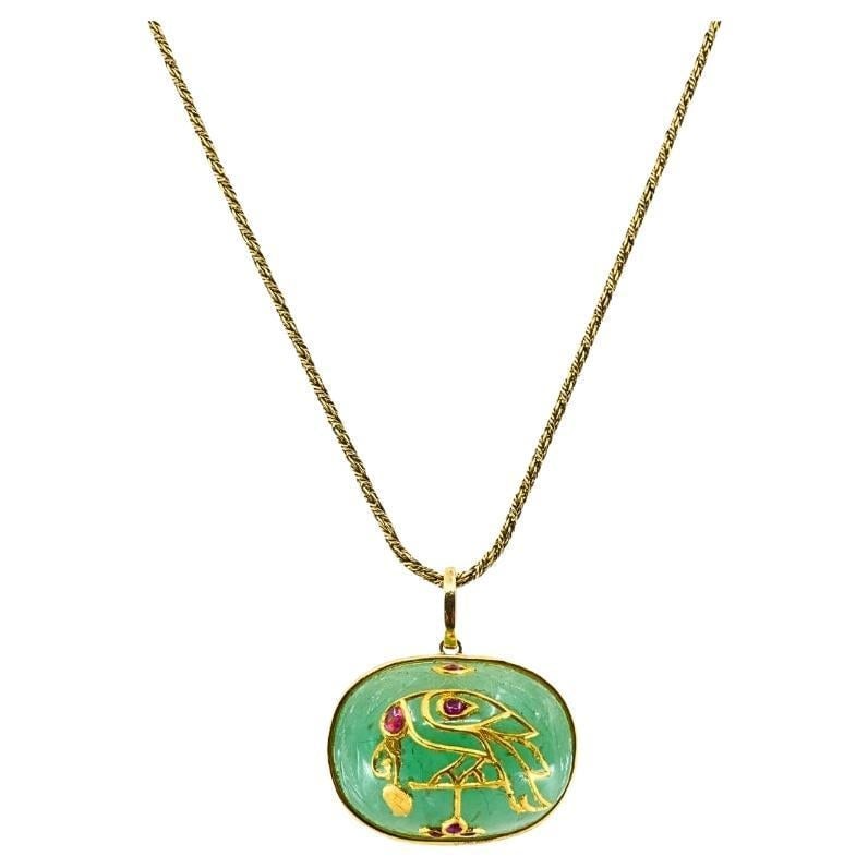 18K Gold Necklace with Carved Emerald Ruby Pendant 1930s: 18K Gold Necklace with Carved Emerald Ruby Pendant 1930s A 1930s yellow gold pendant chain necklace featuring a floral motif carved emerald with ruby detail and a Victorian twisted rope chain. The pie