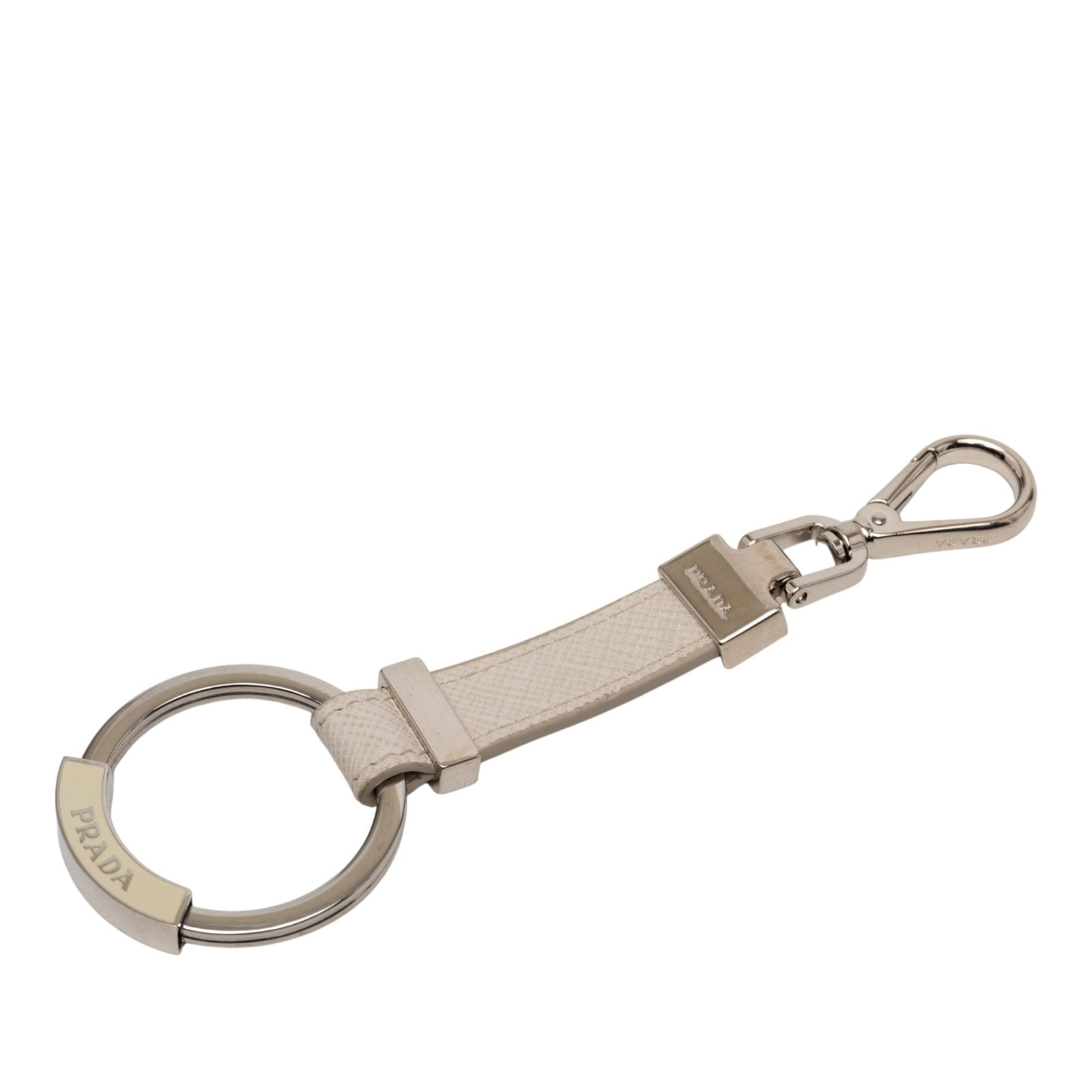 Gray Saffiano Leather Key Chain with Silver Tone Hardware by Prada: Gray Saffiano Leather Key Chain with Silver Tone Hardware by Prada This Prada key holder features a saffiano leather body in gray, complemented by a silver tone key ring and a lobster clasp attachment