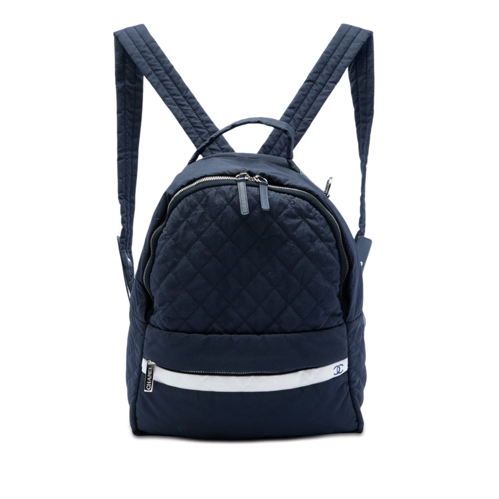 Chanel Sport Line CC Quilted Nylon Backpack Blue: Chanel Sport Line CC Quilted Nylon Backpack Blue Chanel Sport Line backpack in quilted nylon with a top handle, adjustable back straps, and a zip-around closure. The design includes a front exterior z