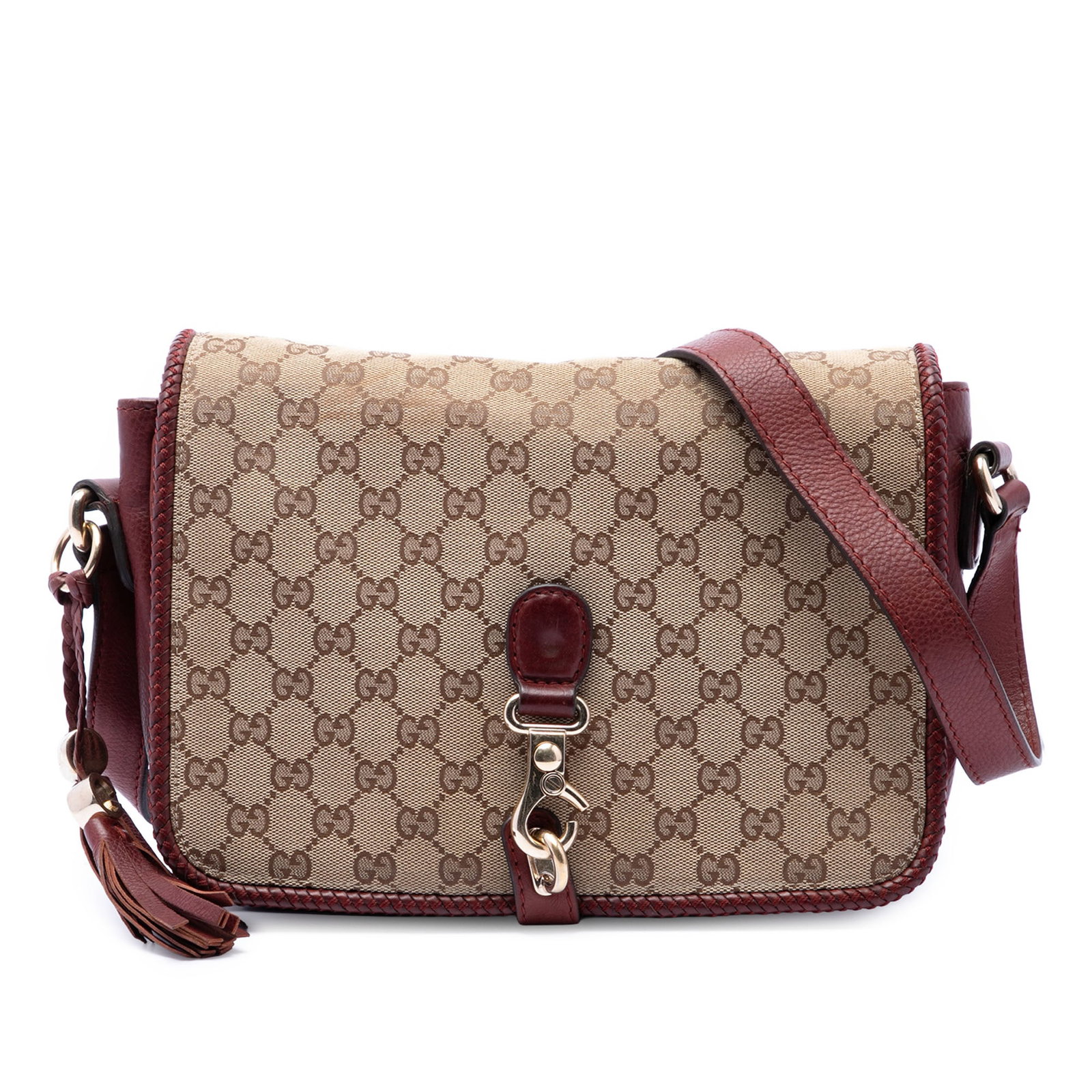 Gucci Marrakech GG Canvas Crossbody Bag with Leather Trim: Gucci Marrakech GG Canvas Crossbody Bag with Leather Trim Gucci GG Canvas Marrakech Crossbody bag with a canvas body, leather trim, and tassel detail. It features an adjustable flat leather strap, a f