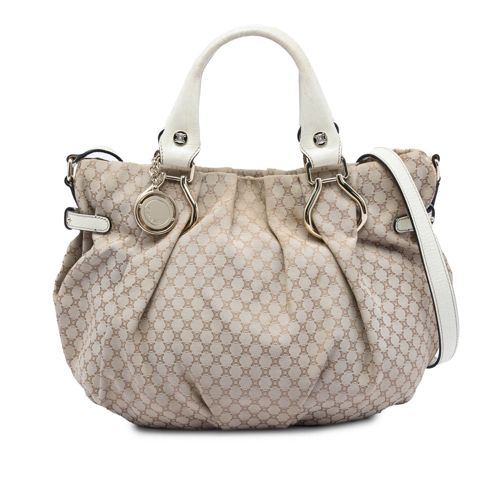 Celine Macadam Pillow Satchel Beige Canvas and Leather Bag: Celine Macadam Pillow Satchel Beige Canvas and Leather Bag Celine Macadam Canvas Pillow Satchel with a canvas body and leather trim. This satchel features rolled leather handles, a flat leather strap,