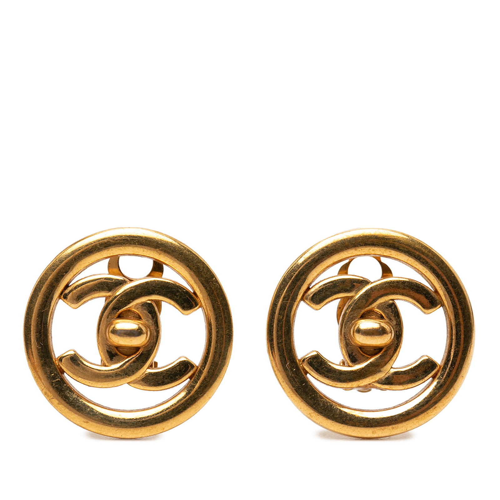 Chanel CC Round Clip On Earrings Gold Plated Turn Lock: Chanel CC Round Clip On Earrings Gold Plated Turn Lock Chanel CC Gold Plated Turn Lock Round Clip On Earrings in gold plated metal with back clip-on closures. Made in France and categorized as costume