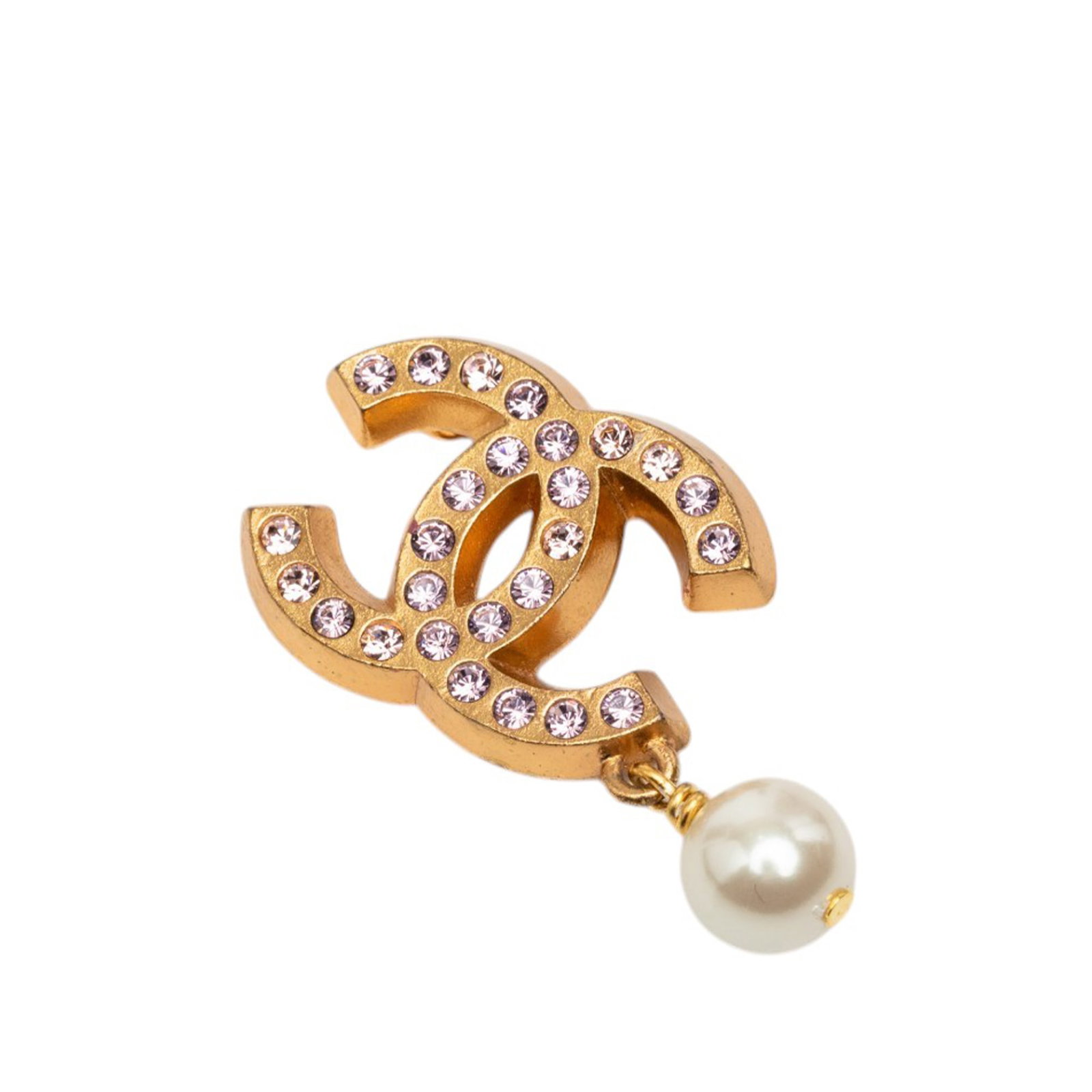 Chanel CC faux pearl strass gold tone brooch: Chanel CC faux pearl strass gold tone brooch Chanel CC brooch with strass embellishments and a faux pearl drop. This costume jewelry piece features a gold tone metal body and secures with a pin closur
