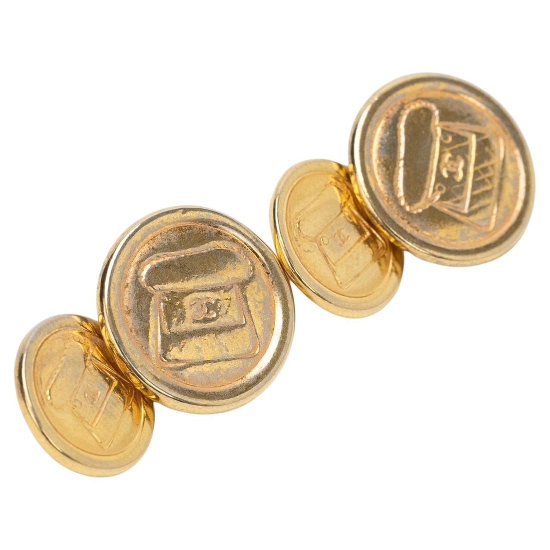 Set of 2 Chanel flap bag cufflinks gold plated rhodium: Set of 2 Chanel flap bag cufflinks gold plated rhodium Vintage Chanel cufflinks featuring an etched flap bag motif. This set includes two gold-plated rhodium cufflinks made in France and comes with a 