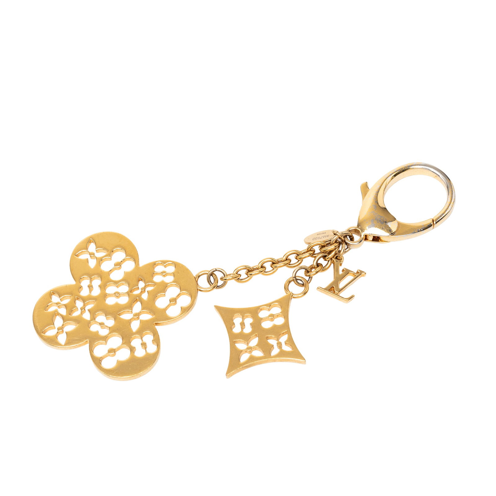 Louis Vuitton Monogram Ivy Flower Gold Tone Bag Charm Key Chain: Louis Vuitton Monogram Ivy Flower Gold Tone Bag Charm Key Chain Louis Vuitton Gold Plated Monogram Ivy Flower Bag Charm with monogram charms and a lobster clasp closure. Includes the dust bag and box.