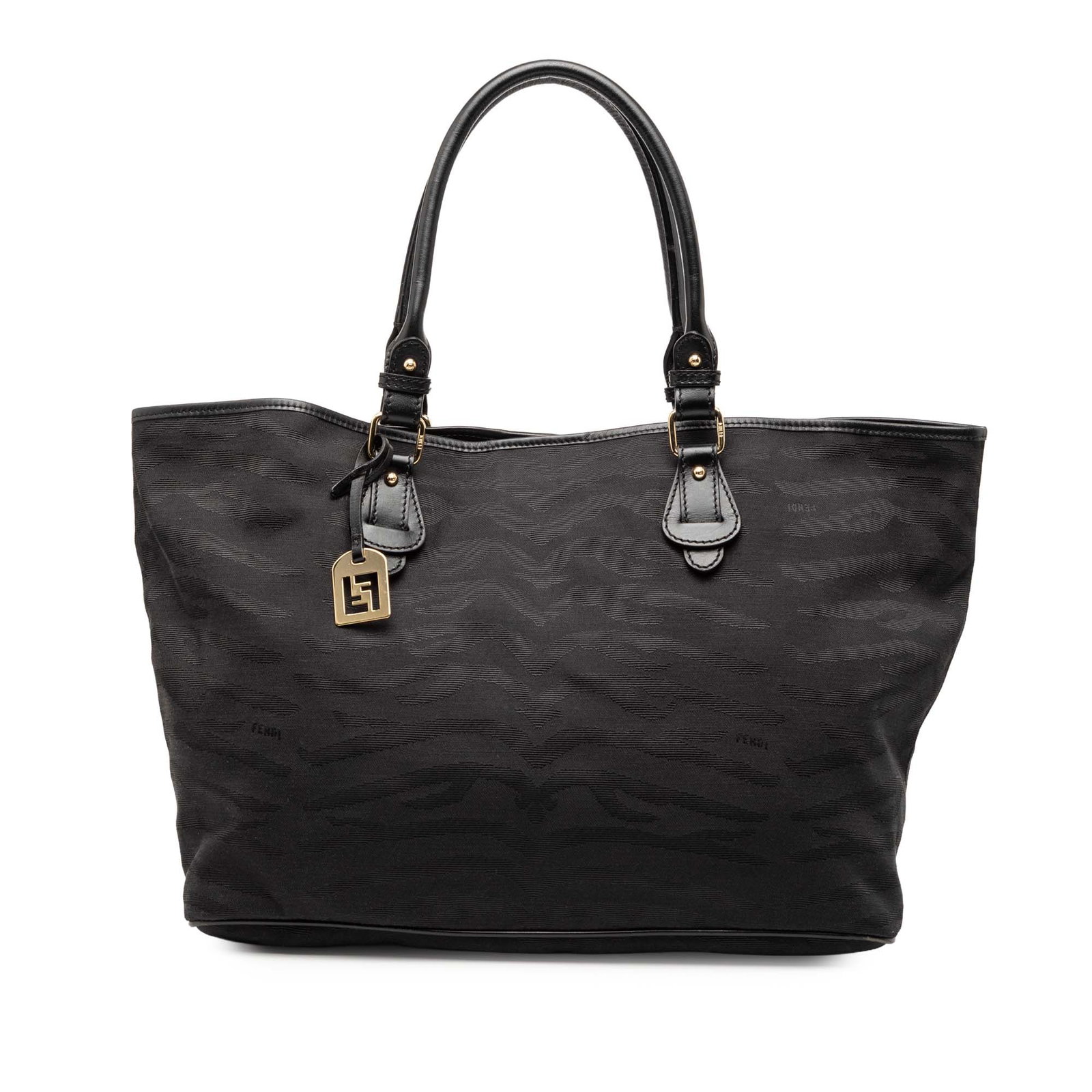 Tiger Pattern Fendi Tote Bag with Leather Trim and Magnetic Closure: Tiger Pattern Fendi Tote Bag with Leather Trim and Magnetic Closure This Fendi tote bag features a striking tiger print on canvas with leather trim, rolled leather handles, and a top magnetic snap but