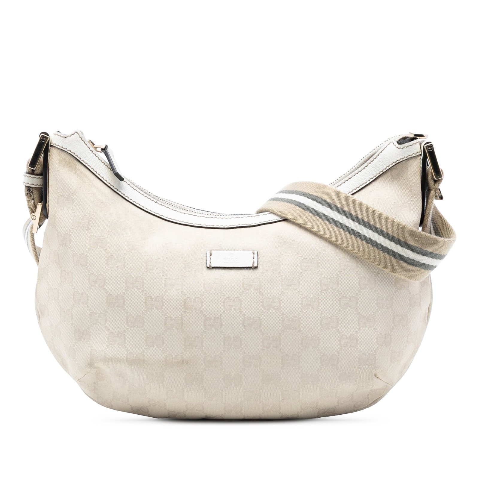 Beige GG Canvas Web Crossbody Bag with Leather Trim by Gucci: Beige GG Canvas Web Crossbody Bag with Leather Trim by Gucci This Gucci GG Canvas Web Crossbody bag features a beige canvas body with leather trim, an adjustable flat strap, a top zip closure, and an 