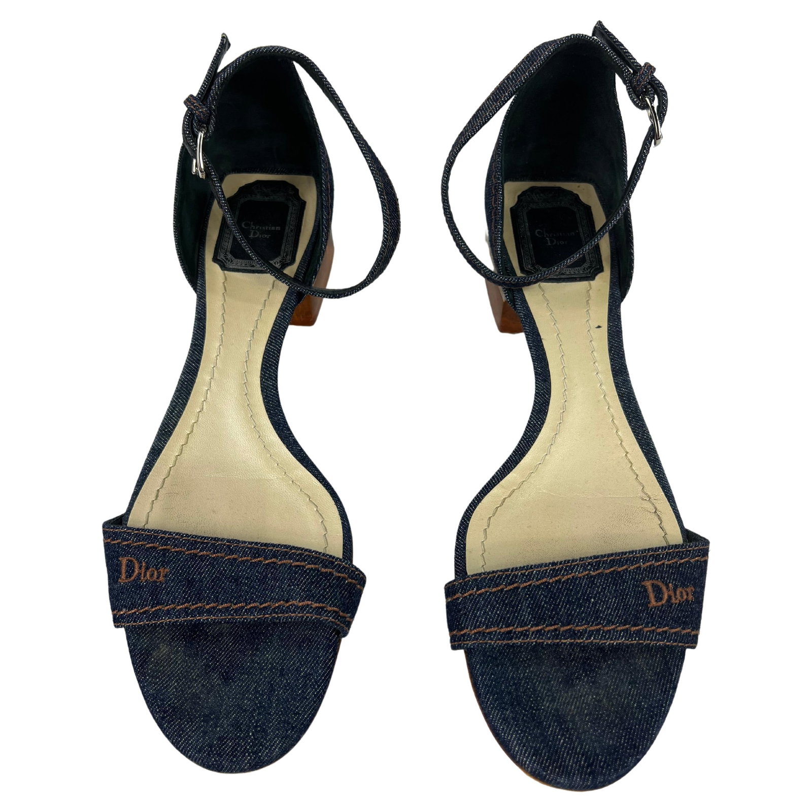 Christian Dior size 40 denim sandals with 1.5 in heel: Christian Dior size 40 denim sandals with 1.5 in heel Christian Dior denim low heel sandals in dark wash denim with a brown acrylic heel and silver tone adjustable buckle closure. The shoes are marked
