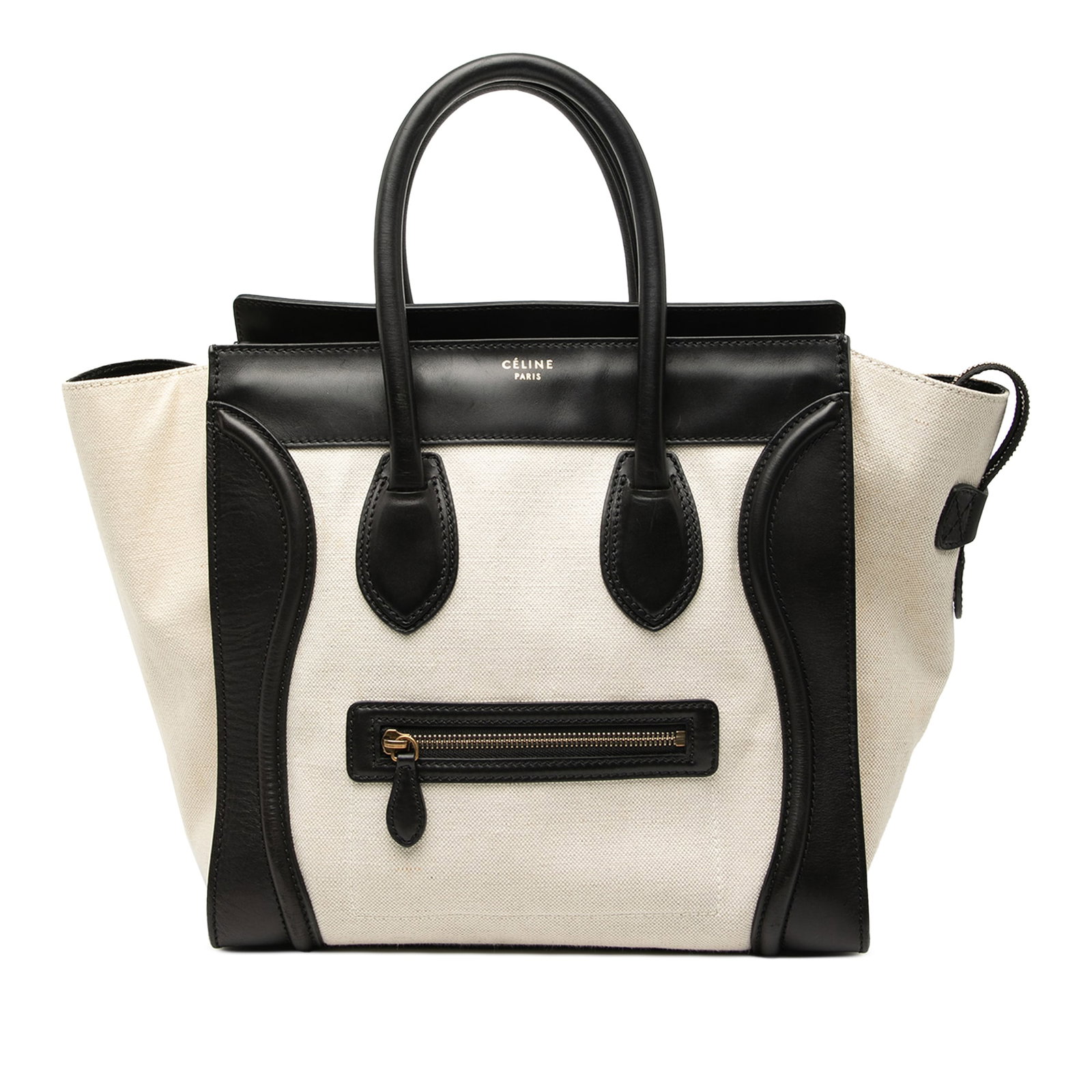Mini Luggage Tote by Celine in Bicolor Canvas and Leather: Mini Luggage Tote by Celine in Bicolor Canvas and Leather This Celine Mini Bicolor Luggage Tote features a canvas body accented with leather trim, rolled leather top handles, and a detachable flat lea