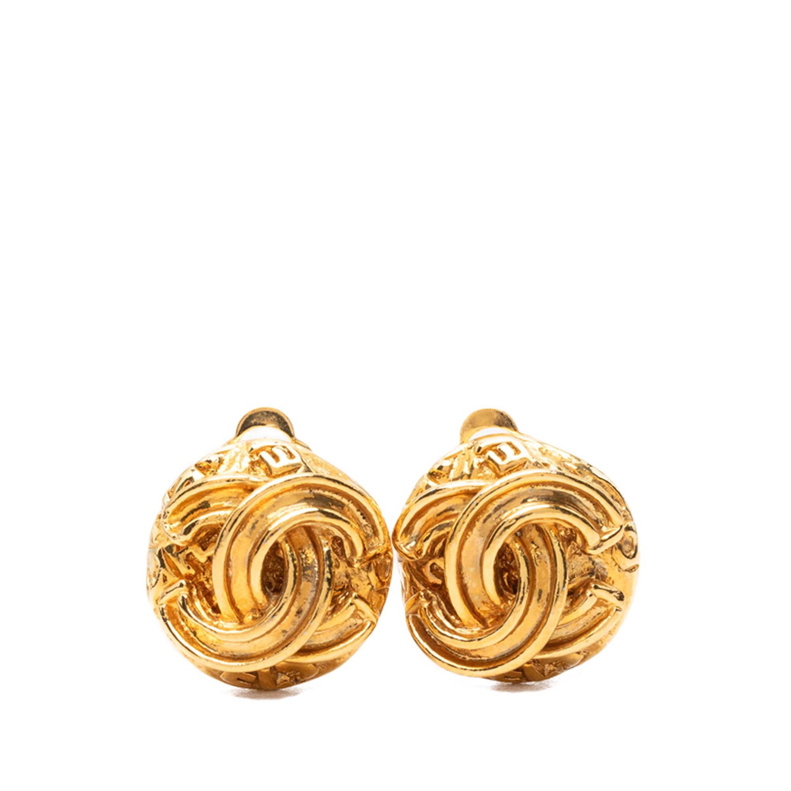 Chanel CC Button Clip Earrings Gold Plated Metal: Chanel CC Button Clip Earrings Gold Plated Metal Chanel CC button clip-on earrings in gold plated metal. This costume jewelry pair is made in France and features the classic button design with clip-on