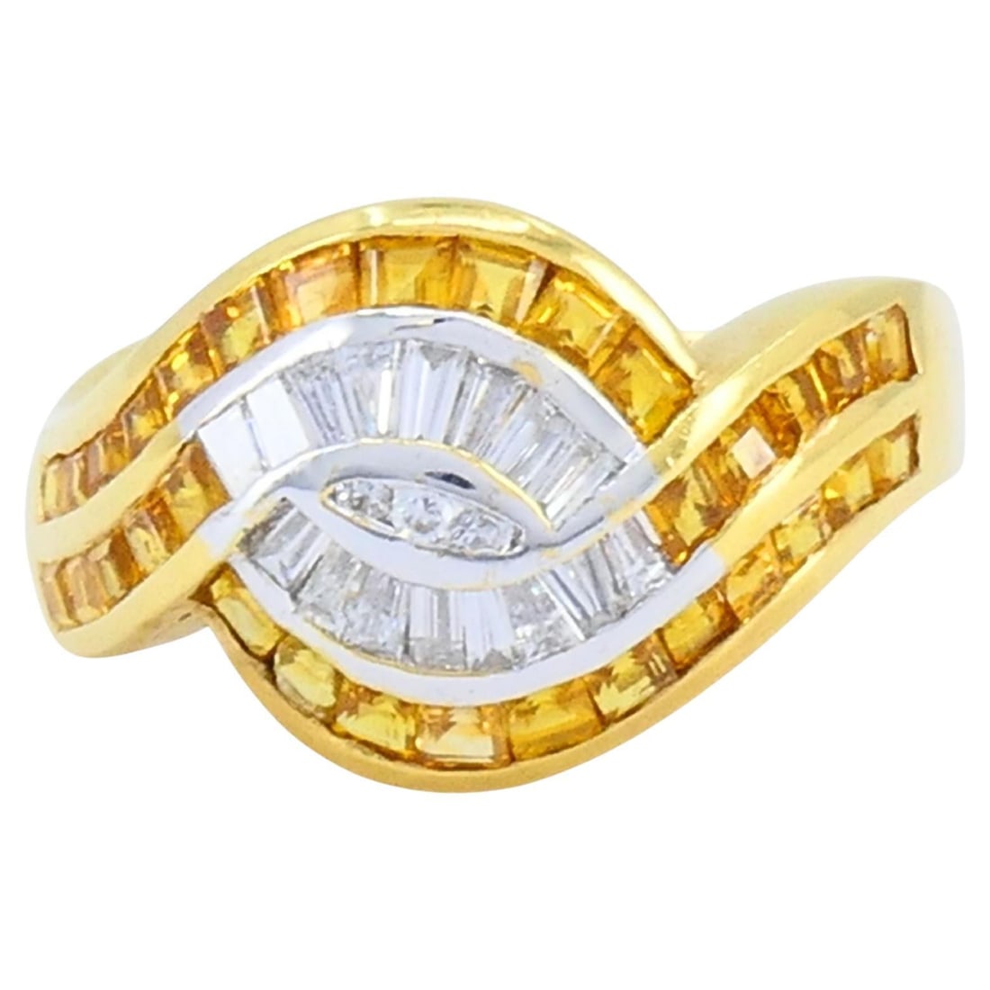 French Wave Motif Ring in 18k Gold with Citrine and Diamonds: French Wave Motif Ring in 18k Gold with Citrine and Diamonds Vintage French ring in 18k gold featuring a sculptural wave motif with tapered baguette diamonds at the center and channel-set baguette cit