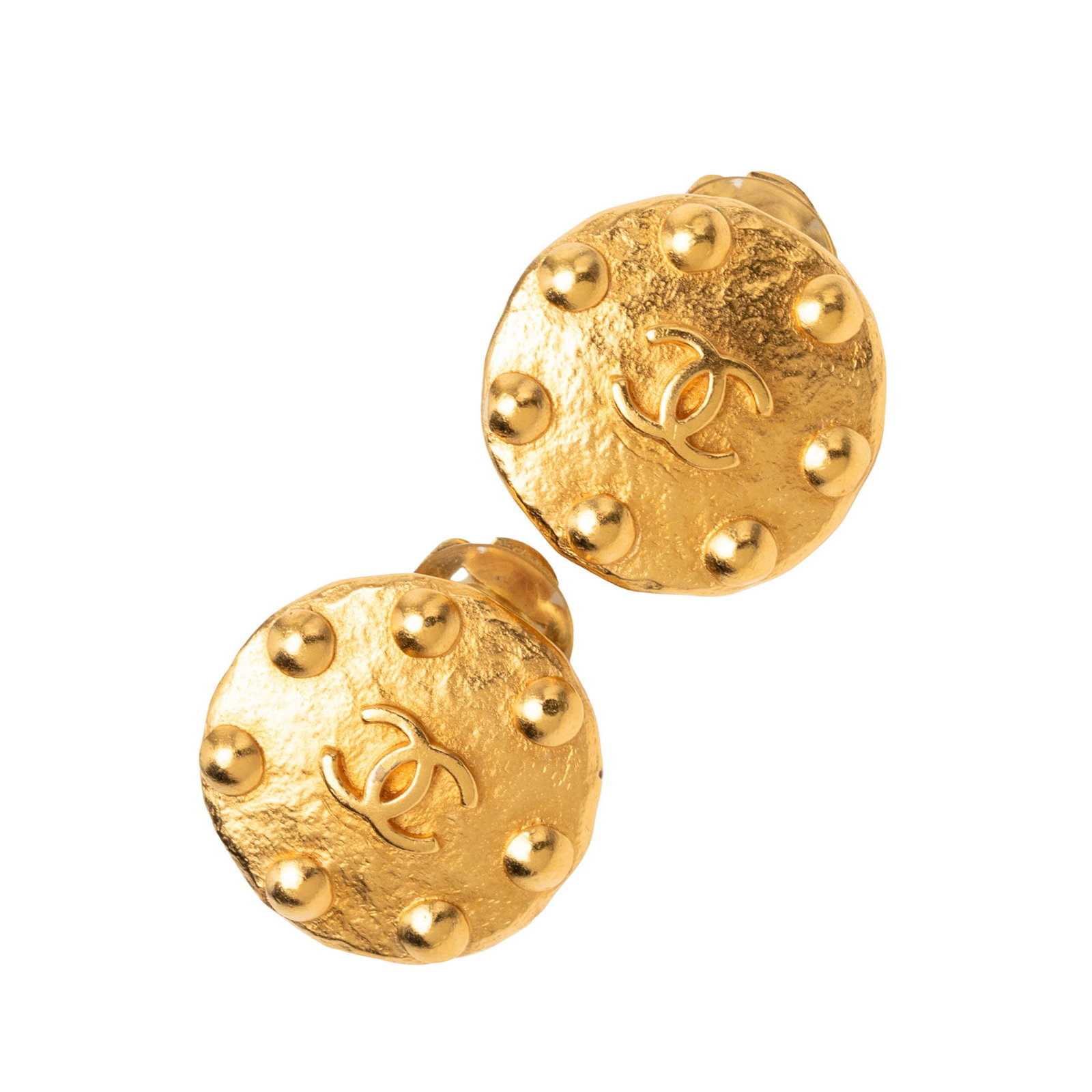 Chanel CC Round Clip On Earrings Gold Tone Metal: Chanel CC Round Clip On Earrings Gold Tone Metal Round Chanel CC clip-on earrings in gold tone metal with the classic CC motif. This costume jewelry pair is made in France and shows scratches to the f