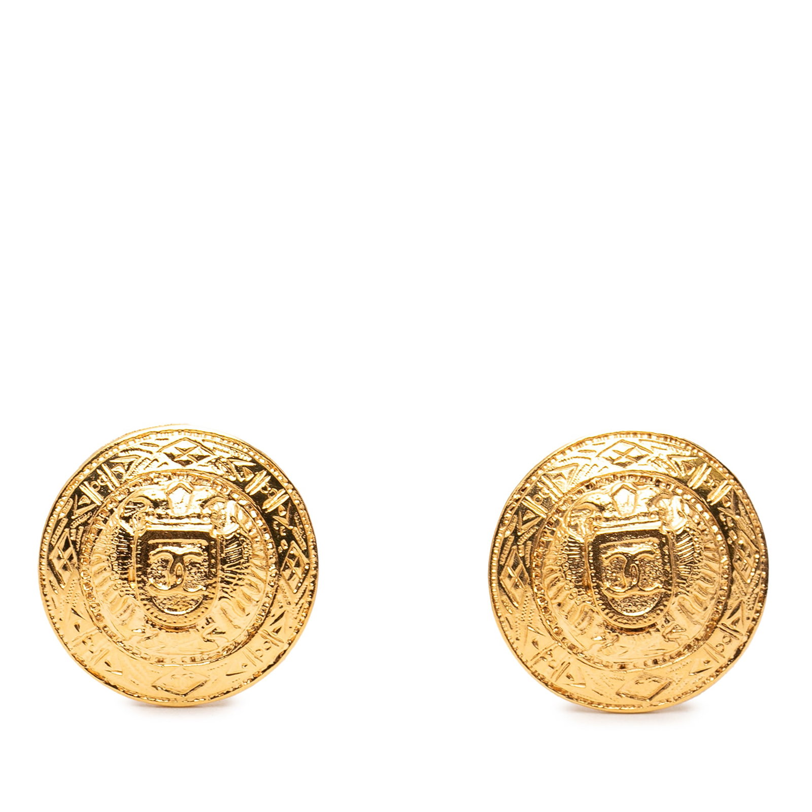 Chanel CC Round Clip On Earrings Gold Plated Metal: Chanel CC Round Clip On Earrings Gold Plated Metal Round Chanel CC clip-on earrings in gold-plated metal. This costume jewelry pair is made in France and features a classic round design with clip-on c