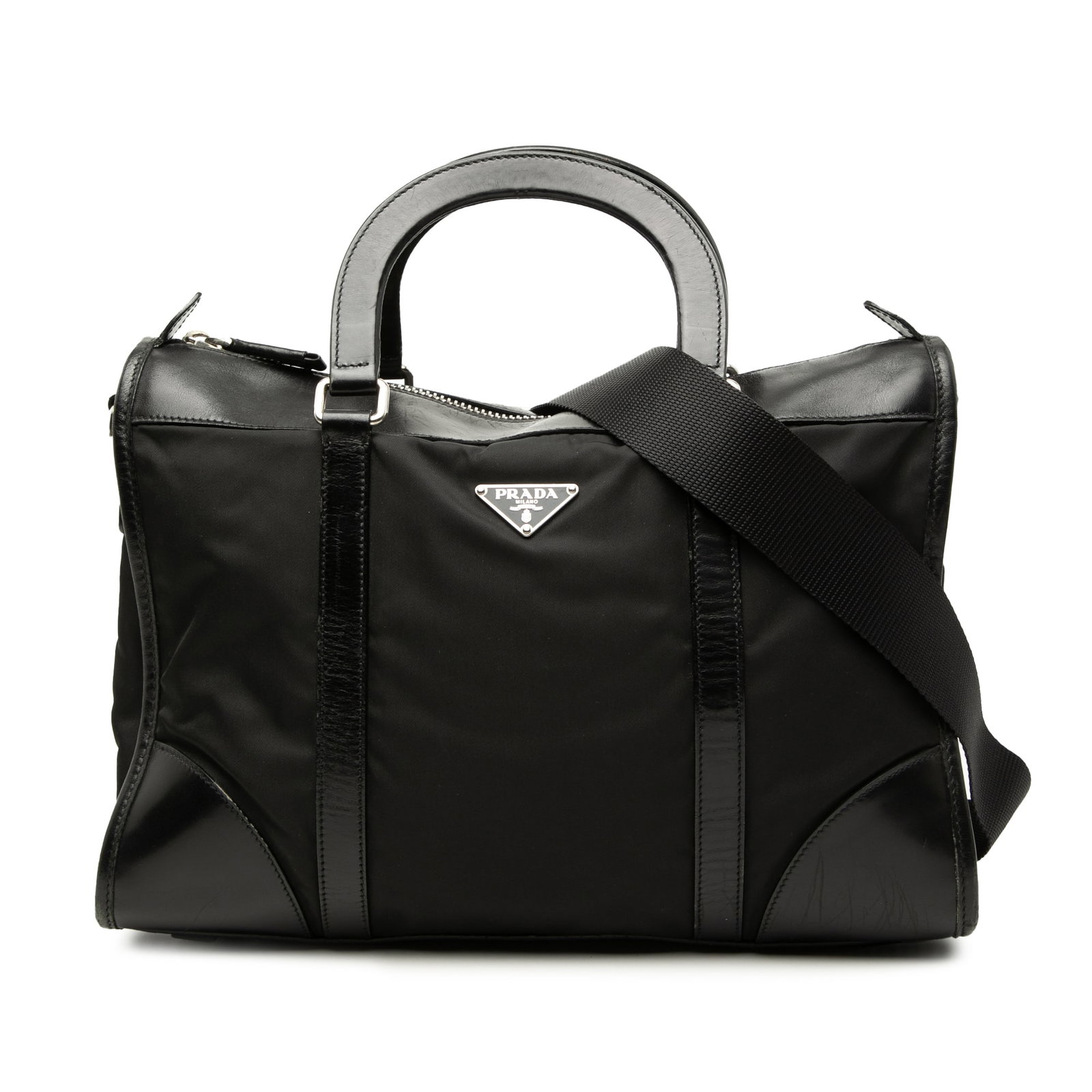 Prada Tessuto Satchel Bag Black Nylon Leather Trim: Prada Tessuto Satchel Bag Black Nylon Leather Trim The Prada Tessuto Top Handle Bag is a black satchel bag made with a nylon body and leather trim. It features flat leather handles, a detachable and a