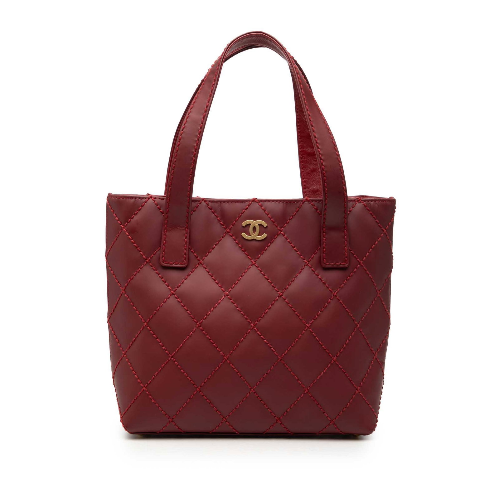 Chanel Small CC Surpique Calfskin Leather Tote Bag Red: Chanel Small CC Surpique Calfskin Leather Tote Bag Red Chanel Small CC Calfskin Surpique Tote in red leather with flat leather straps, an open top with magnetic snap closure, and a well-organized inte