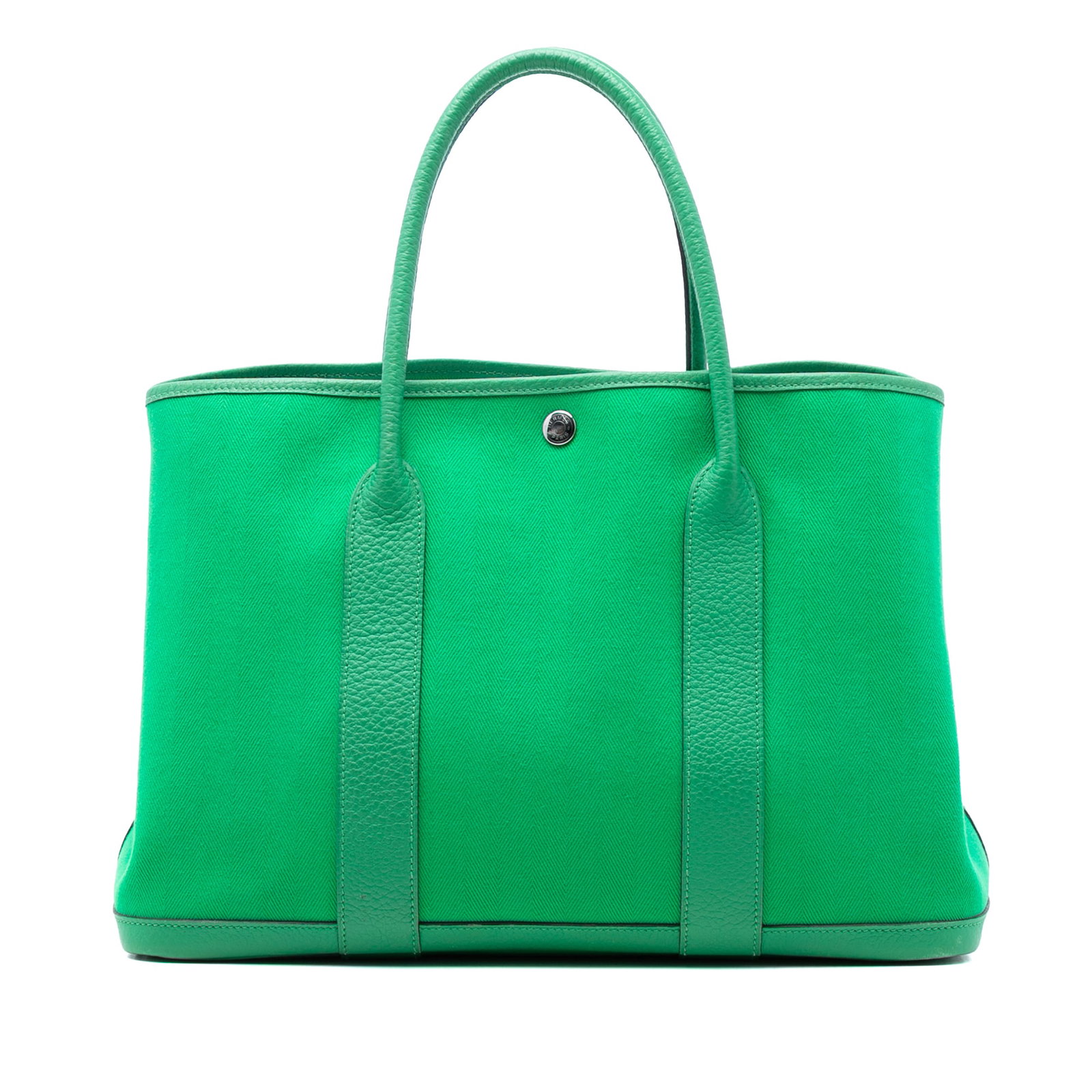 Hermes Garden Party 36 Canvas and Leather Green Tote Bag: Hermes Garden Party 36 Canvas and Leather Green Tote Bag This Hermes Garden Party 36 features a canvas body with leather trim, rolled leather handles, and an open top with a snap button closure. The b