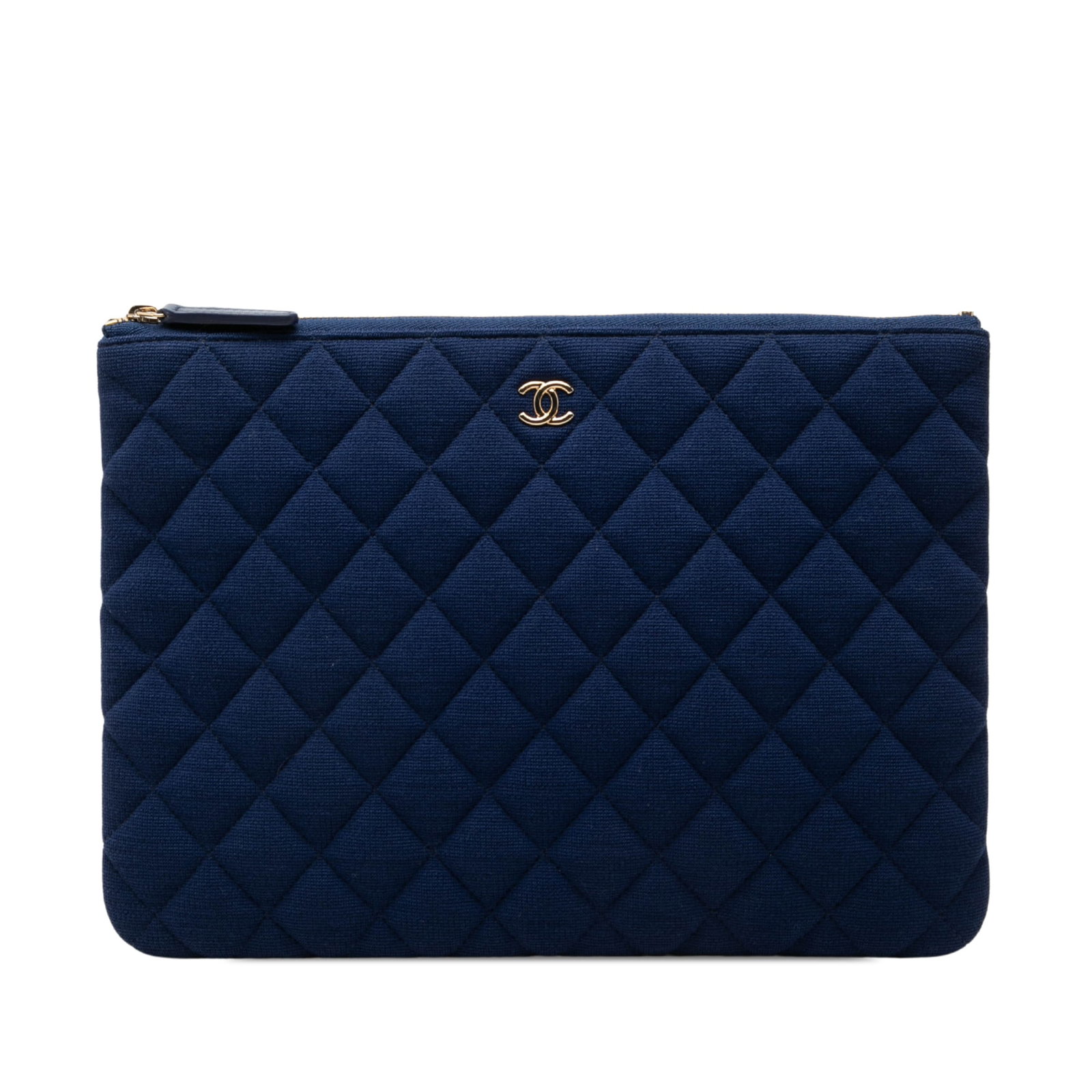Chanel O Case Medium Clutch in Blue Quilted Jersey: Chanel O Case Medium Clutch in Blue Quilted Jersey Chanel Medium Quilted Jersey O Case Clutch in blue quilted fabric with a top zip closure, an exterior back slip pocket, and an interior zip pocket. I