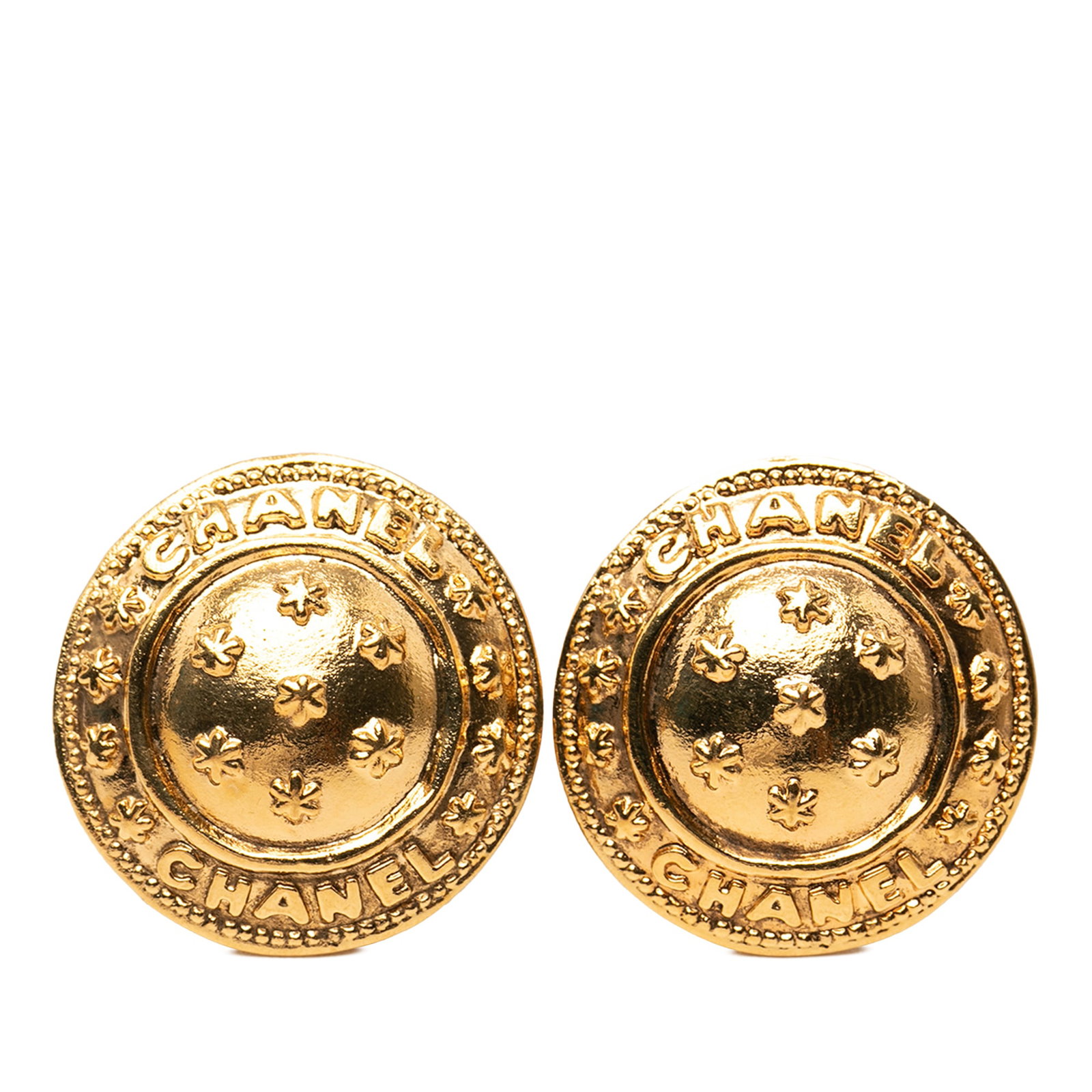 Chanel Round Logo Clip Earrings Gold Plated Metal: Chanel Round Logo Clip Earrings Gold Plated Metal Gold plated round clip-on earrings with a logo design. They are made in metal, feature clip-on closures, and are described as costume jewelry. Origin: