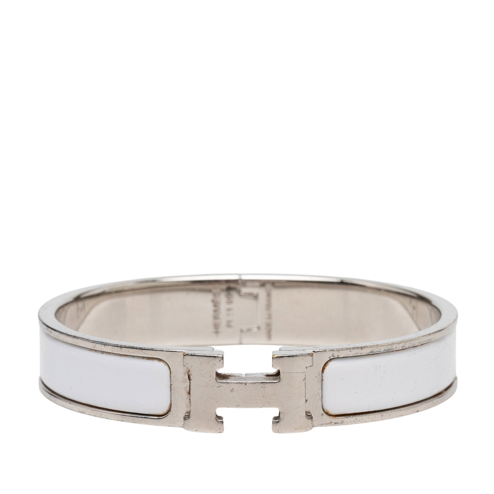 Hermes Clic Clac H PM narrow enamel bracelet: Hermes Clic Clac H PM narrow enamel bracelet Hermes Narrow Enamel Clic Clac H Bracelet PM with an enamel body, palladium-plated metal accents, and a metal clasp closure. Includes the dust bag and box.