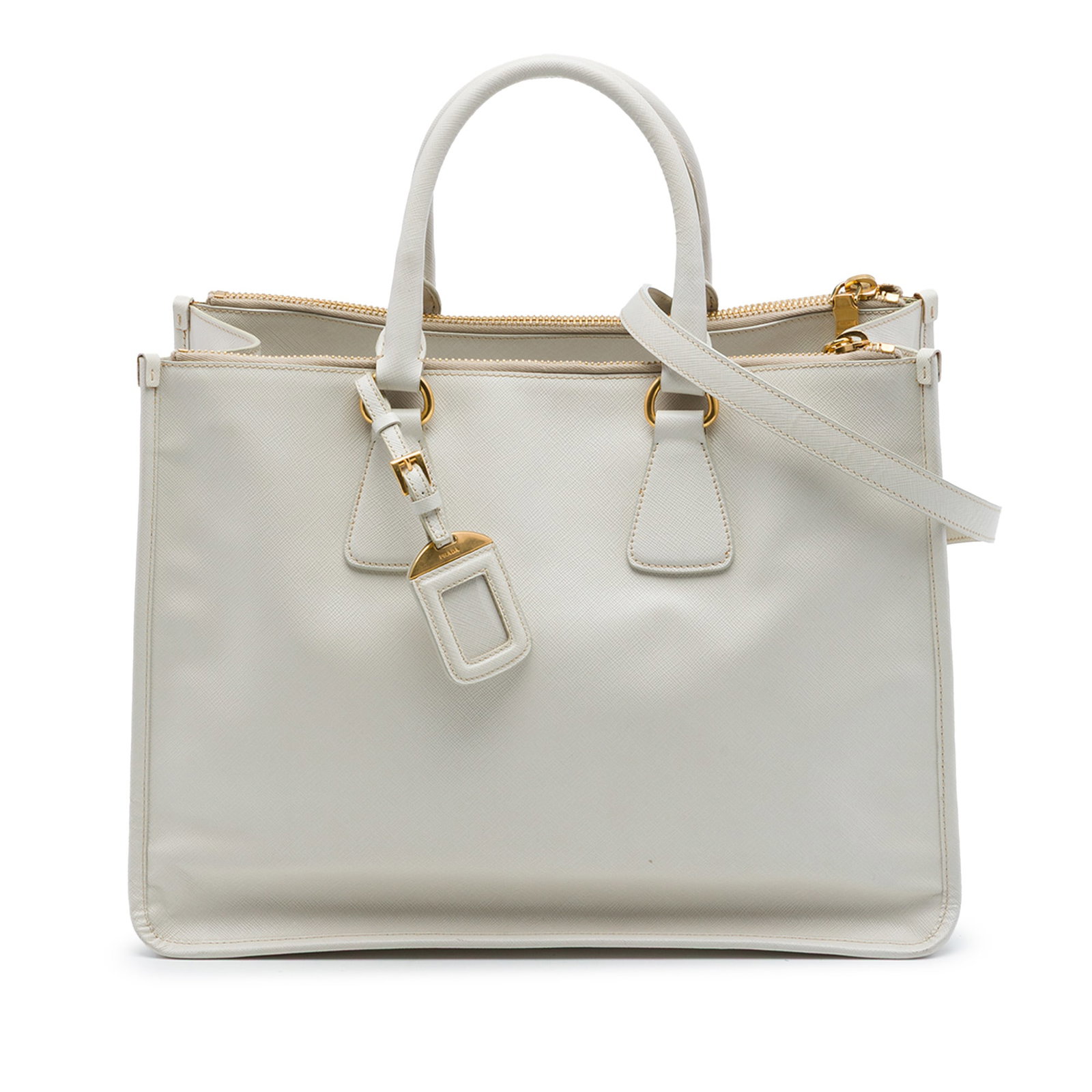 Prada Saffiano Lux leather satchel with double zip compartments: Prada Saffiano Lux leather satchel with double zip compartments Prada Saffiano Lux Double Zip Satchel in white leather with rolled handles, a detachable flat strap, an open top, and dual zip compartme