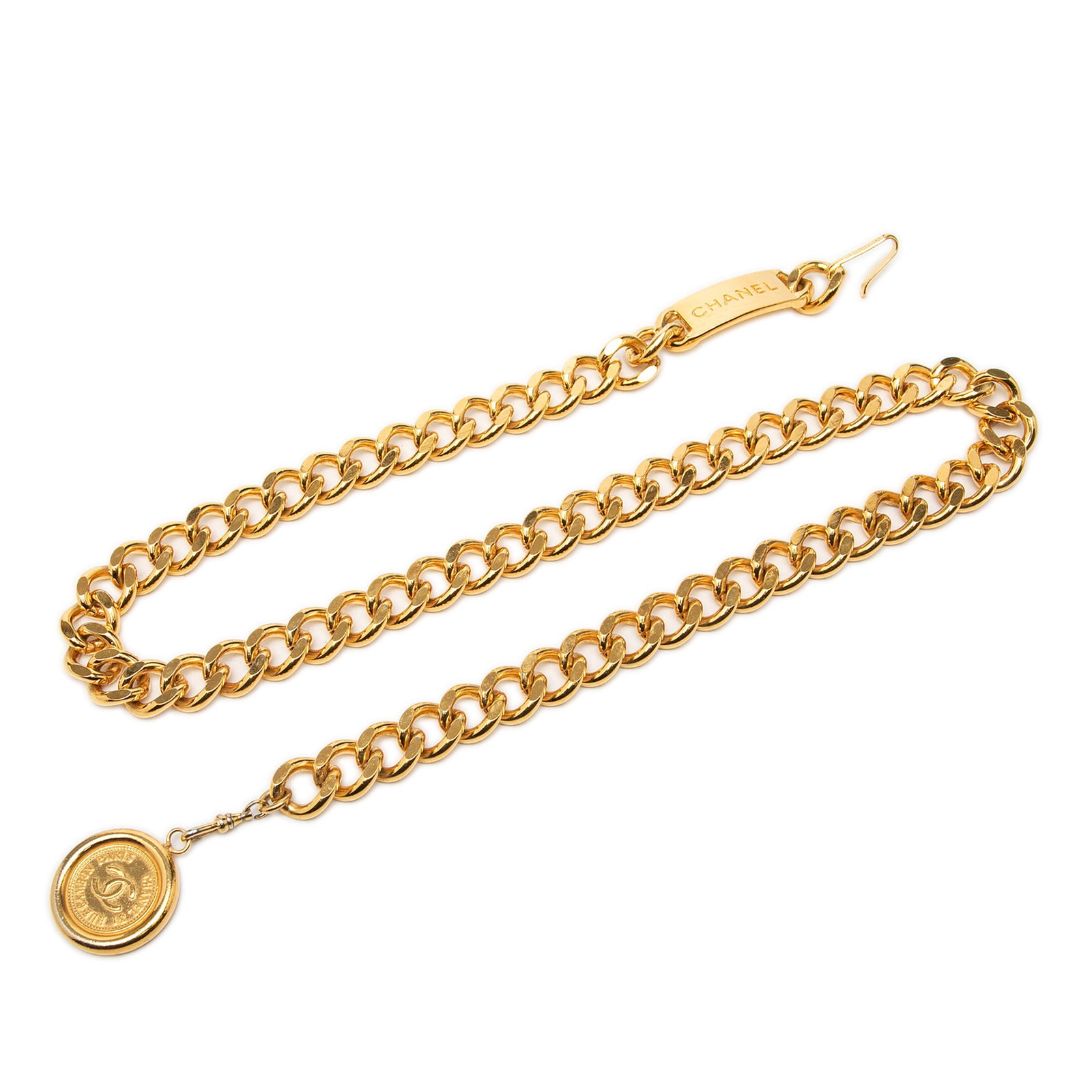 Chanel 31 Rue Cambon CC Medallion Gold Tone Chain Belt: Chanel 31 Rue Cambon CC Medallion Gold Tone Chain Belt Chanel chain belt featuring a gold tone metal chain with a 31 Rue Cambon CC medallion charm and hook closure. Made in France. Condition is B+ wit