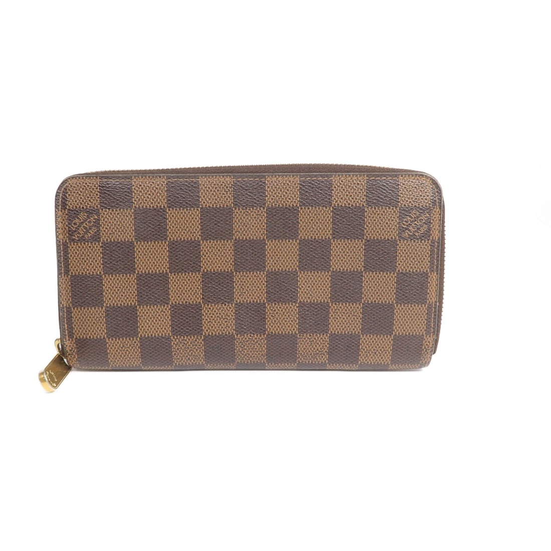Louis Vuitton N60015 Zippy Wallet Damier Brown PVC Canvas: Louis Vuitton N60015 Zippy Wallet Damier Brown PVC Canvas Louis Vuitton Zippy Wallet in Damier Brown, designed as an around long wallet with a zip-around closure. It is made from PVC coated canvas wit