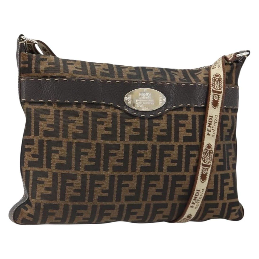 FENDI Zucca Canvas Shoulder Bag in Black Brown Italy: FENDI Zucca Canvas Shoulder Bag in Black Brown Italy Authentic Fendi shoulder bag in black and brown Zucca canvas. This women's bag is made in Italy and features an adjustable shoulder strap. Included