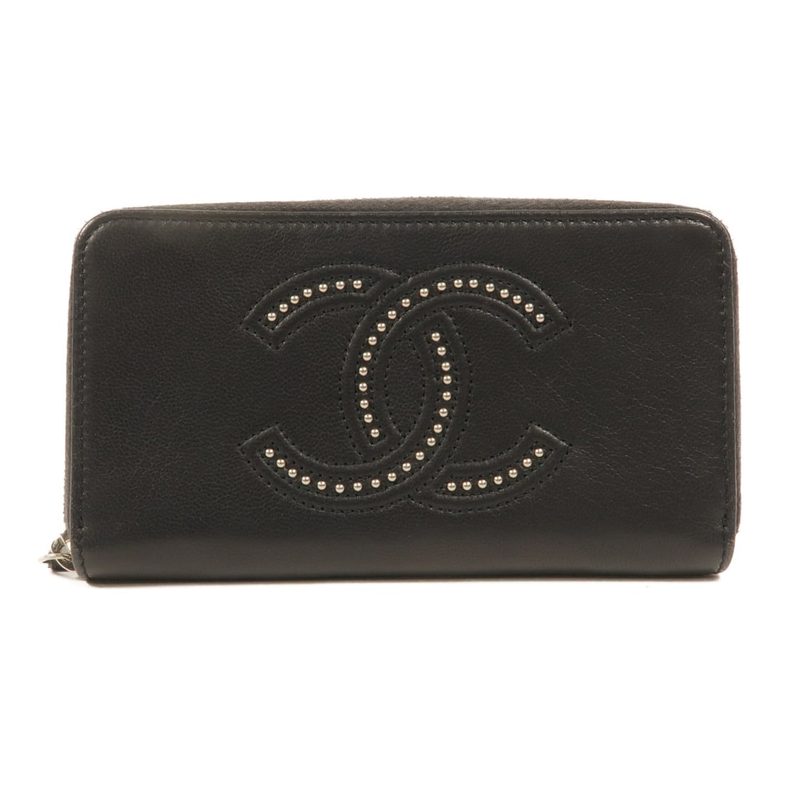 CHANEL studded CC zip around long wallet black lambskin: CHANEL studded CC zip around long wallet black lambskin Black lambskin zip-around long wallet with a studded CC design and silver-tone hardware. Includes hologram sticker and guarantee card. Condition