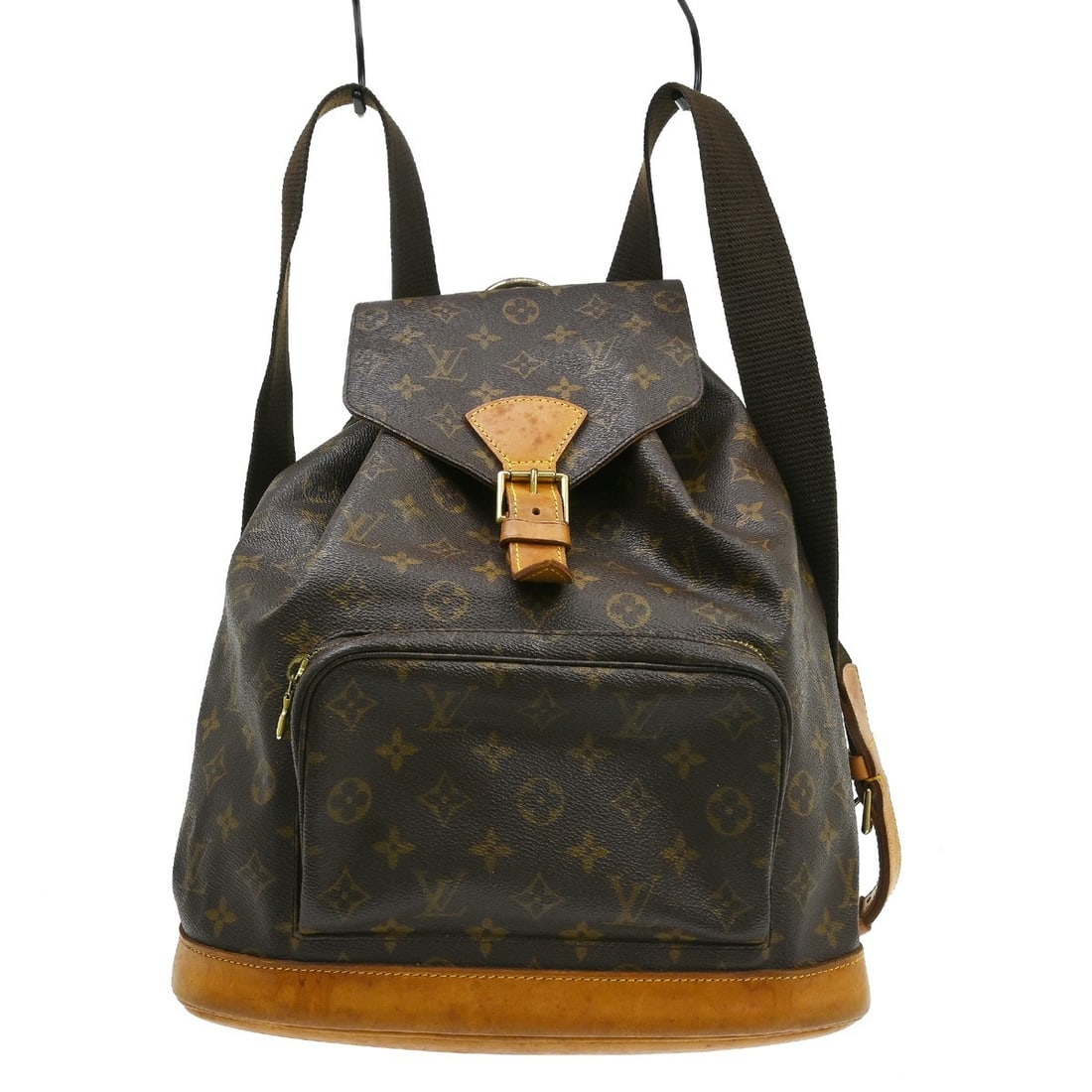 Louis Vuitton Montsouris GM Monogram Canvas Backpack M51135: Louis Vuitton Montsouris GM Monogram Canvas Backpack M51135 Vintage Louis Vuitton Montsouris GM backpack in brown Monogram canvas with leather trim. This unisex backpack features a buckle and drawstri
