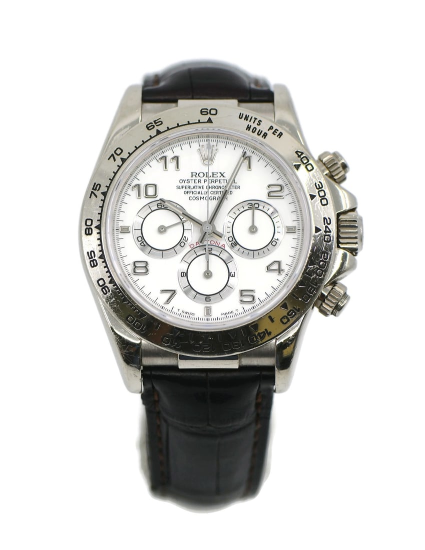 Rolex Daytona Zenith 18K White Gold Wristwatch 16519 with Box and Papers: Rolex Daytona Zenith 18K White Gold Wristwatch 16519 with Box and Papers Experience the timeless elegance of the Rolex Daytona Zenith, a luxurious wristwatch crafted from 18K white gold. This exquisit