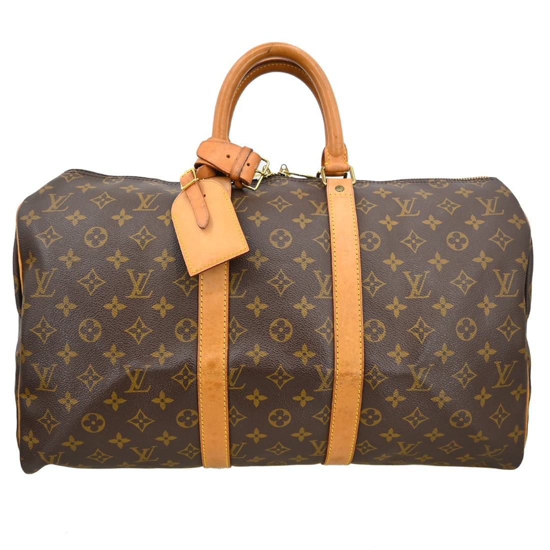 Louis Vuitton Keepall Brown Canvas Travel Bag: Louis Vuitton Keepall Brown Canvas Travel Bag Louis Vuitton Keepall in brown monogram canvas. This unisex bag is made in France and is presented in good condition with visible wear. Noted condition de