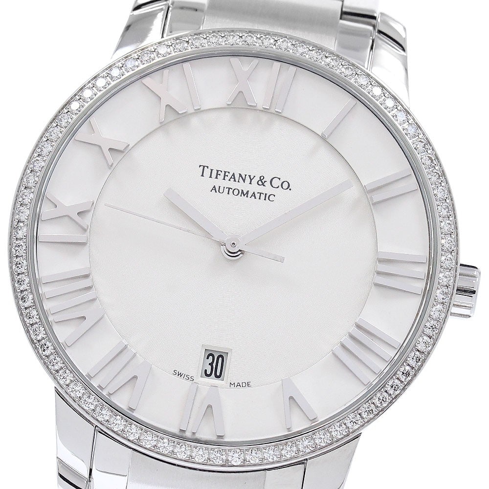 Mens Automatic Wristwatch Tiffany Co Atlas Dome Ref Z1801.68.10B21A00A: Mens Automatic Wristwatch Tiffany Co Atlas Dome Ref Z1801.68.10B21A00A Pre-owned TIFFANY&Co. Atlas Dome men's wristwatch with automatic movement and date function. This watch features a silver dial wi