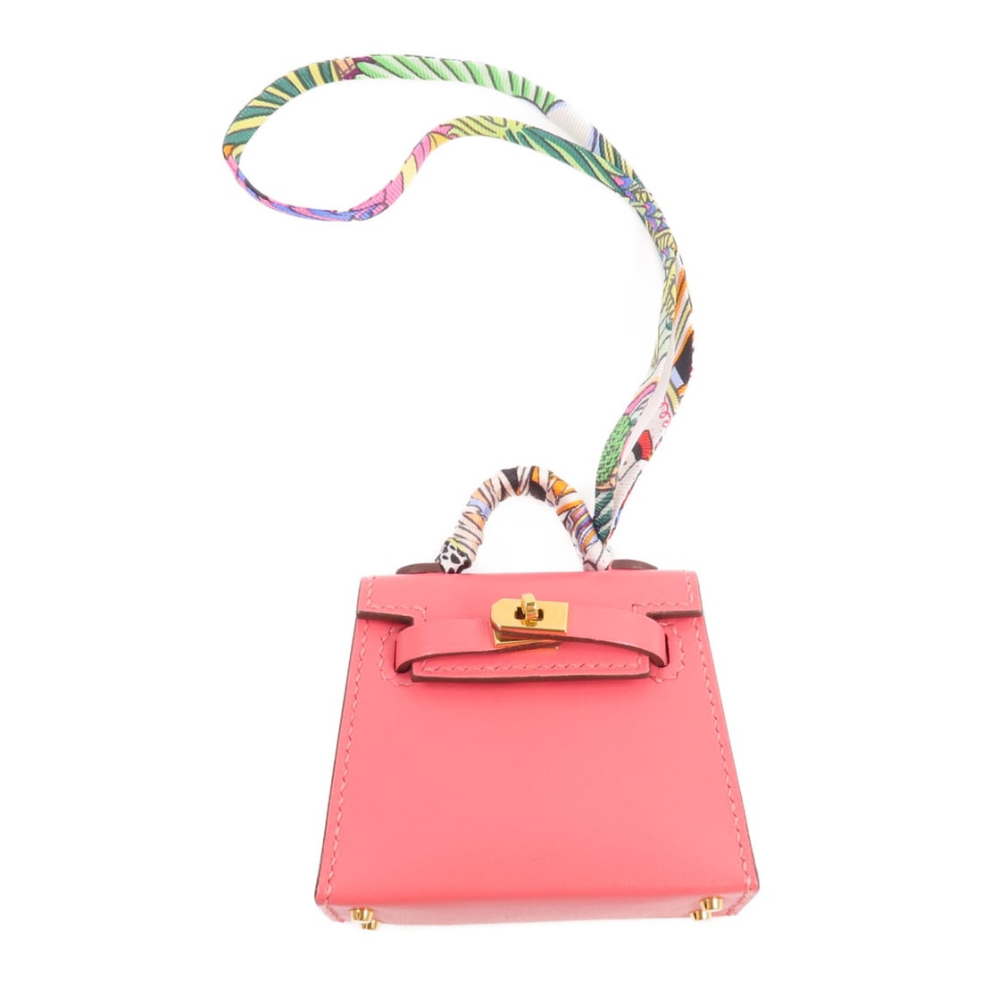Hermes Mini Kelly Twilly Bag Charm Rose Azalee Calfskin: Hermes Mini Kelly Twilly Bag Charm Rose Azalee Calfskin Mini Kelly Twilly bag charm in Rose Azalee, made from Tadelakt leather and calfskin (cowhide). It features a turn lock and comes with storage bo