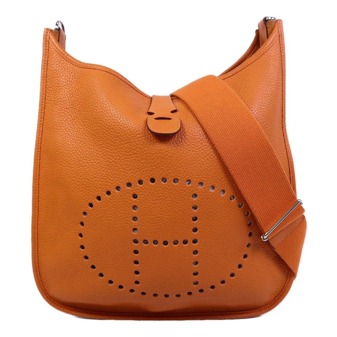 Hermes Evelyne PM Orange Clemence Leather Shoulder Bag PHW: Hermes Evelyne PM Orange Clemence Leather Shoulder Bag PHW Hermes Evelyne PM shoulder bag in orange Taurillon Clemence and calfskin. This women's shoulder bag is made in France and includes a shoulder