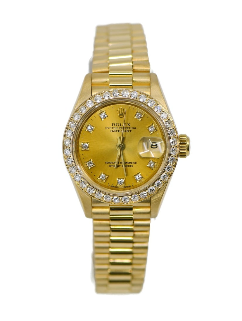 Rolex 69178 Datejust womens 18K yellow gold diamond wristwatch: Rolex 69178 Datejust womens 18K yellow gold diamond wristwatch Pre-owned Rolex Datejust wristwatch in 18K yellow gold with a round polished case and Rolex President bracelet. This women's watch featur