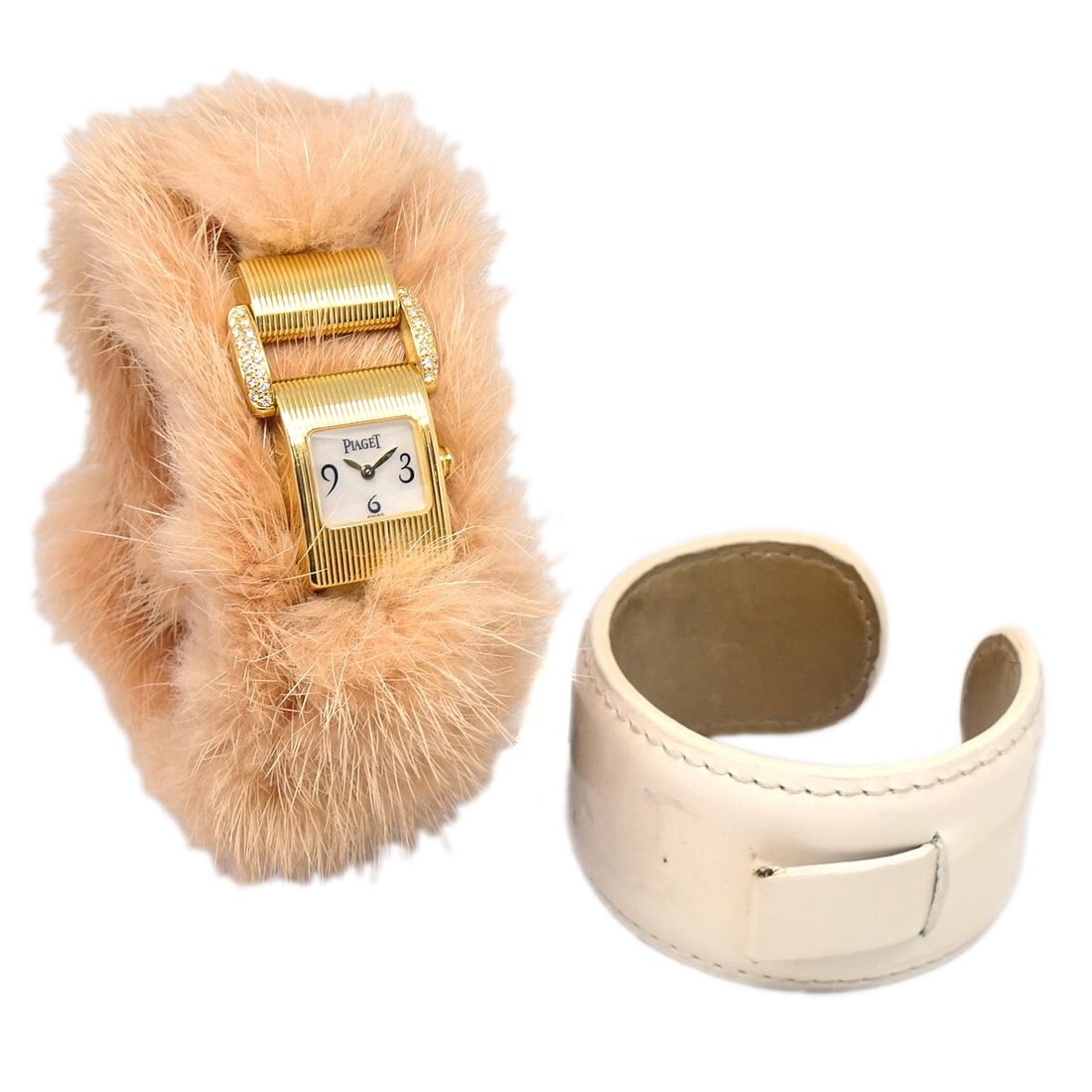 Piaget Miss Protocole 5222 Ladies Quartz Watch 18K Yellow Gold Diamond Fur Band: Piaget Miss Protocole 5222 Ladies Quartz Watch 18K Yellow Gold Diamond Fur Band Piaget Miss Protocole Ref. 5222 is a women's wristwatch with a quartz movement and analog display. It features a gold-to