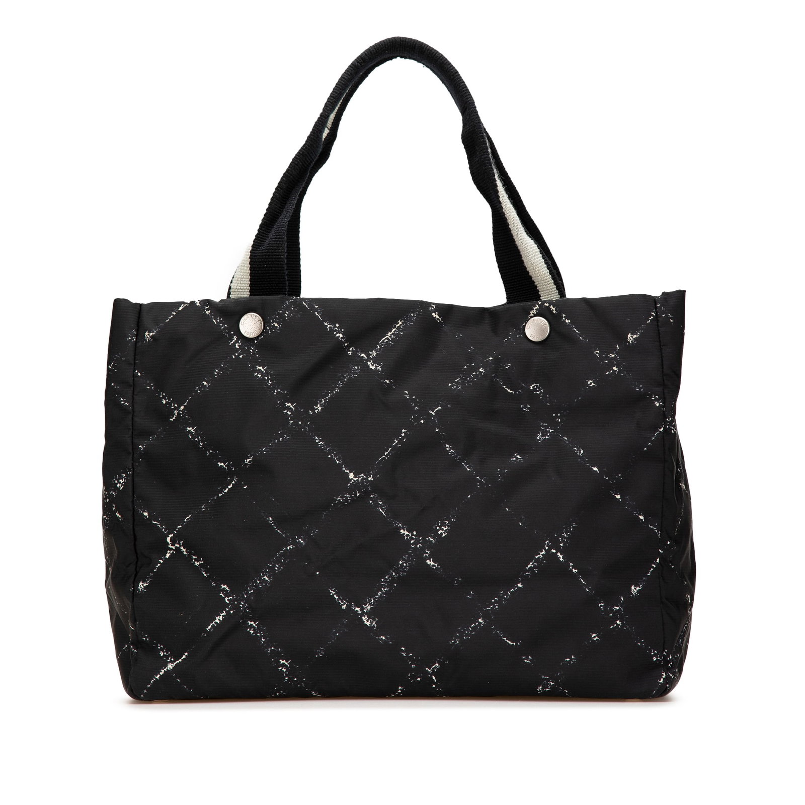 Chanel Old Travel Line Black Nylon Tote Bag: Chanel Old Travel Line Black Nylon Tote Bag This Chanel Old Travel Line Nylon Tote is a stylish and practical accessory, crafted from durable nylon in classic black. It features flat straps and an ope