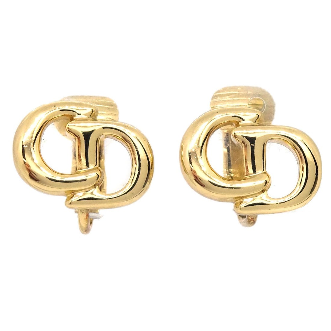 Christian Dior Gold Plated Clip On Earrings: Christian Dior Gold Plated Clip On Earrings Christian Dior clip-on earrings in gold-plated metal with a gold-tone finish. Made in Italy, this pair presents a compact classic design and is offered in v