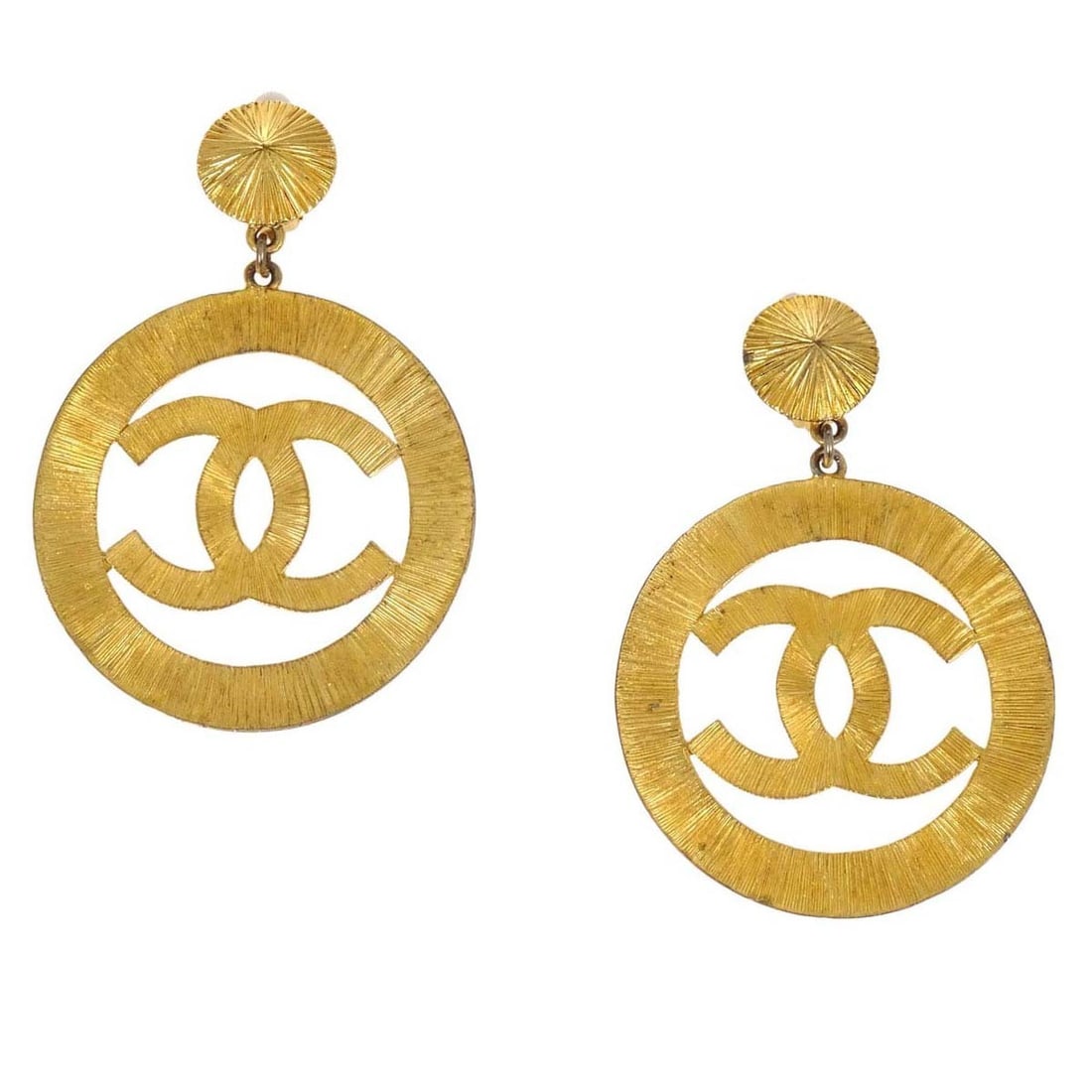 Chanel 93P Gold Plated Clip On CC Hoop Dangle Earrings: Chanel 93P Gold Plated Clip On CC Hoop Dangle Earrings Chanel dangle CC hoop clip-on earrings in gold-plated material, made in France. The earrings are round in shape with a button style and clip-on c