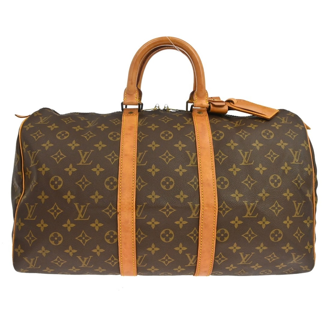 Louis Vuitton Keepall Brown Monogram Canvas Travel Bag: Louis Vuitton Keepall Brown Monogram Canvas Travel Bag Louis Vuitton Keepall in brown monogram canvas. This unisex bag is made in France and remains in good condition overall, with visible signs of us